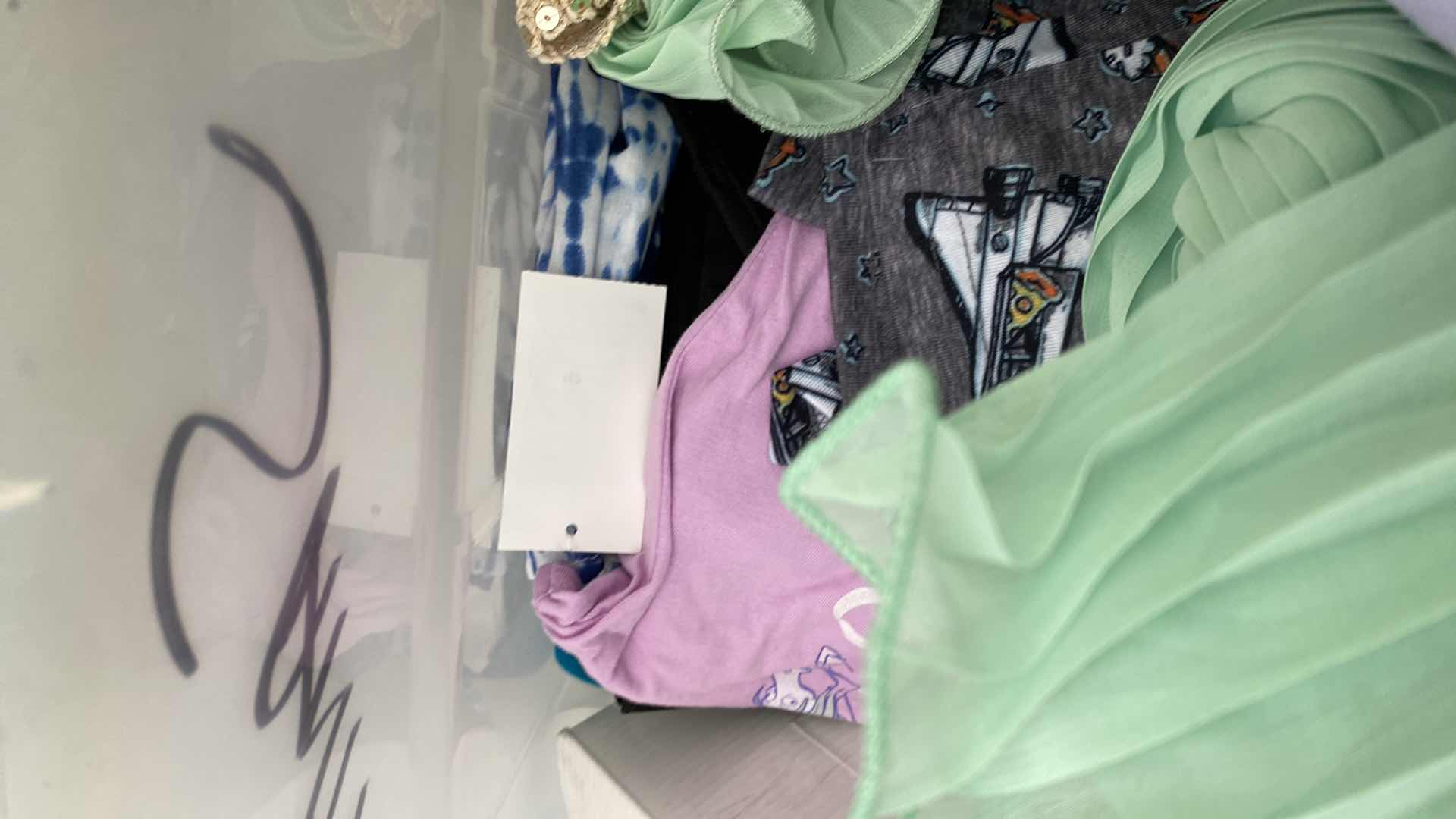 Photo 1 of TOTE  OF MISCELLANEOUS CLOTHING - SOME WITH TAGS