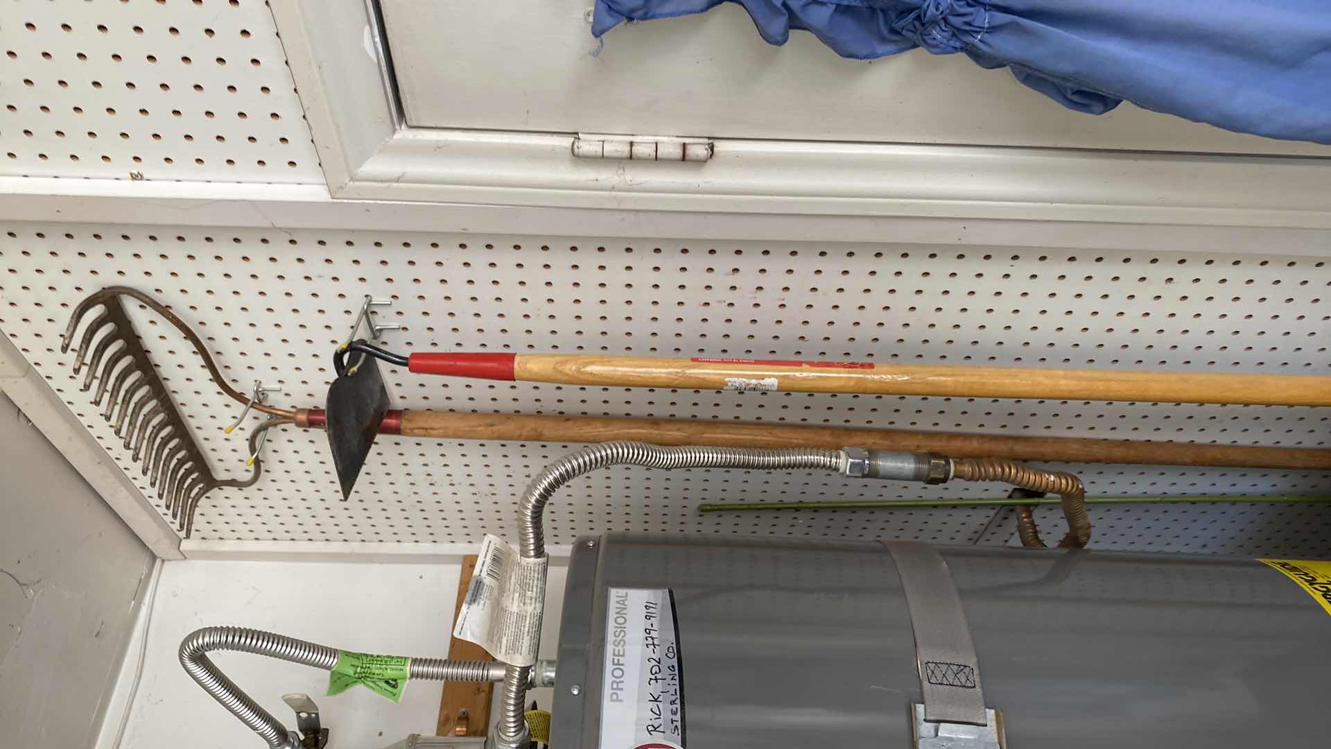 Photo 1 of HANGING TOOLS ON PEGBOARD AND INSECT KILLER