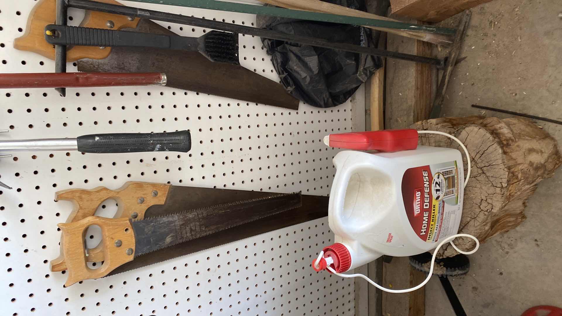 Photo 1 of HANGING TOOLS ON PEGBOARD AND INSECT KILLER