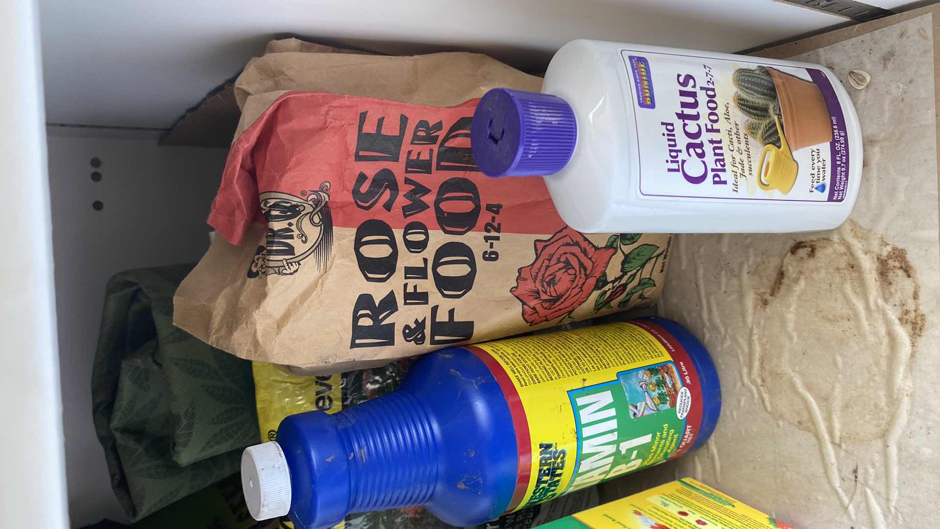 Photo 1 of CONTENTS OF GARAGE CABINET AND DRAWER GARDENING SUPPLIES AND MORE