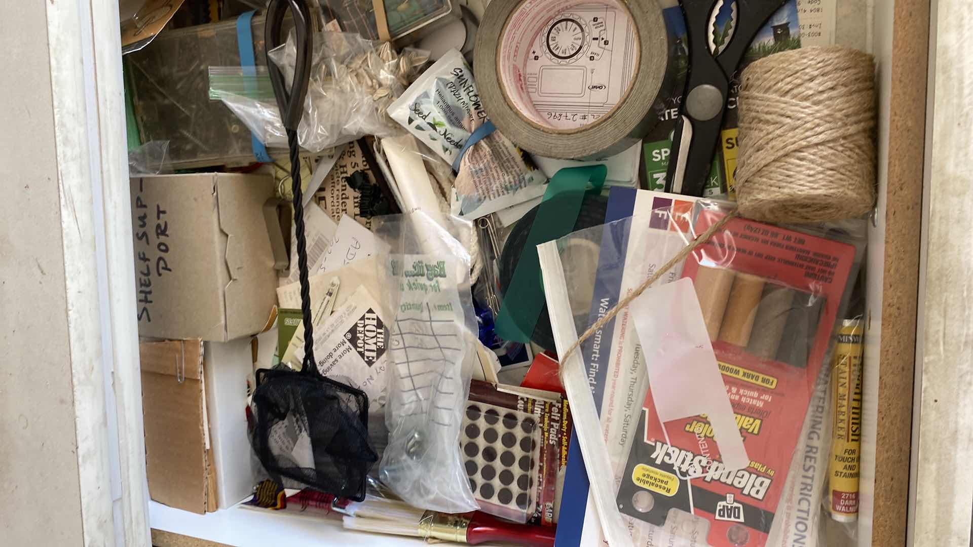 Photo 1 of CONTENTS OF GARAGE CABINET AND DRAWER GARDENING SUPPLIES AND MORE