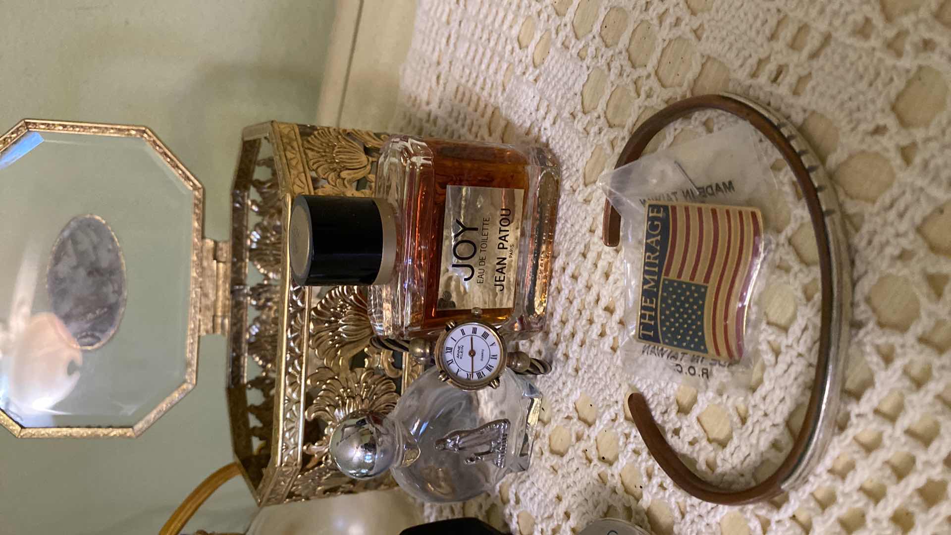 Photo 1 of PERFUME BOTTLES AND JEWELRY BOX ANNE KLEIN WATCH AND A BRACELET