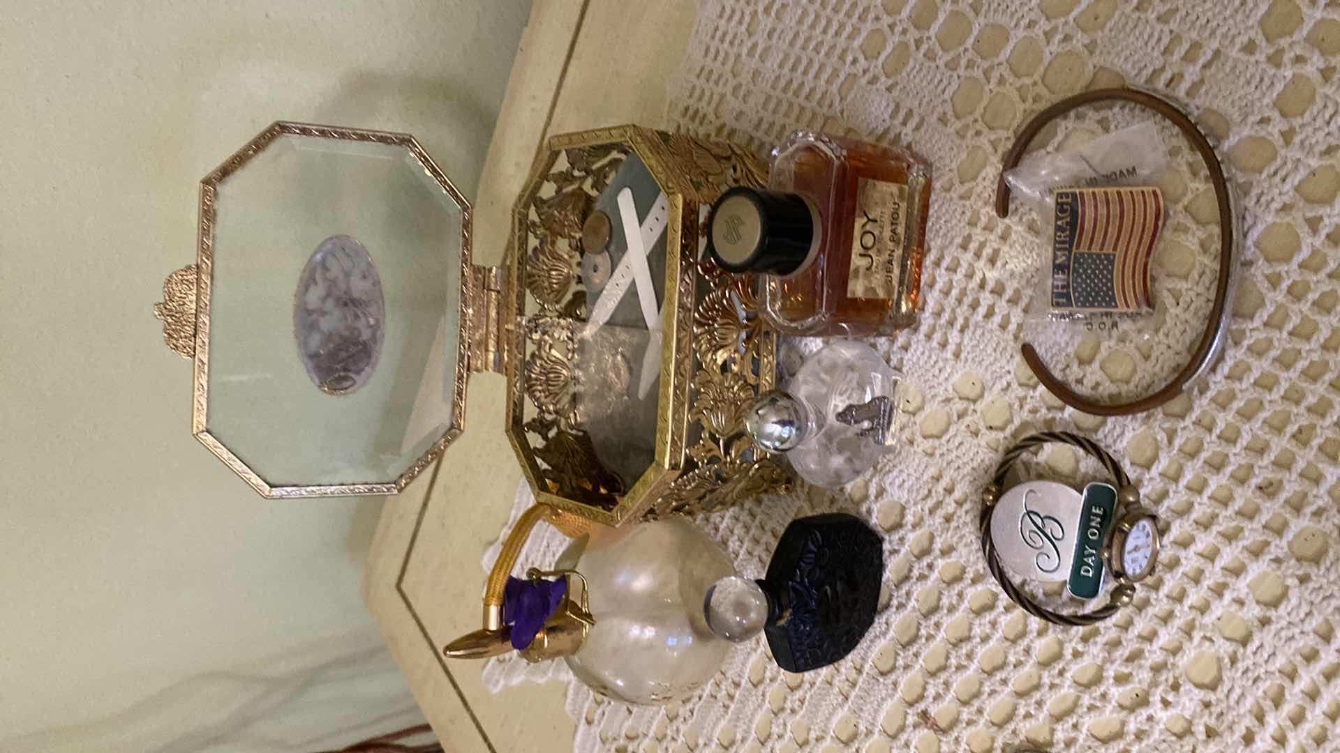 Photo 1 of PERFUME BOTTLES AND JEWELRY BOX ANNE KLEIN WATCH AND A BRACELET