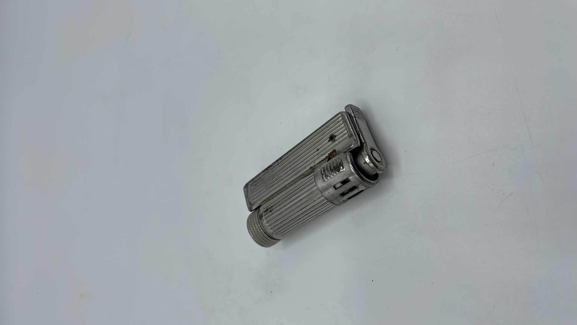 Photo 1 of VINTAGE POCKET FLASHLIGHT, LIGHTER AND SILVERWARE