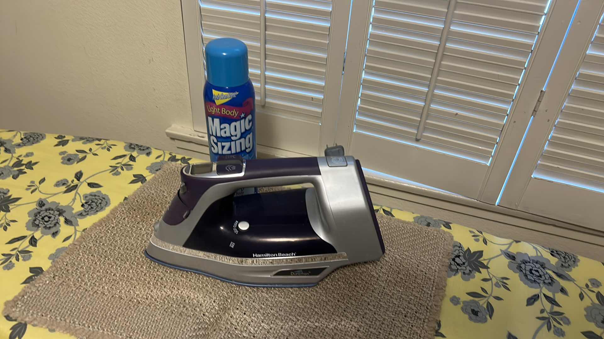 Photo 1 of IRON AND IRONING BOARD