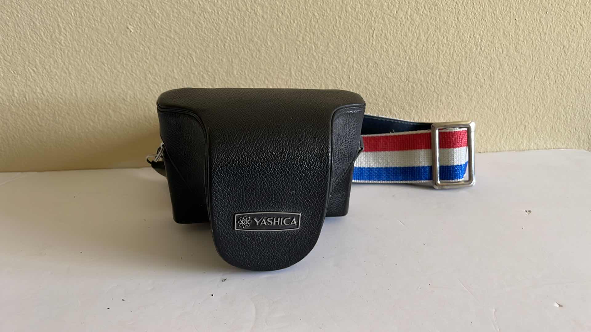 Photo 1 of YASHICA ELECTRO 35 GSN 35mm CAMERA W/CASE AND FILTER