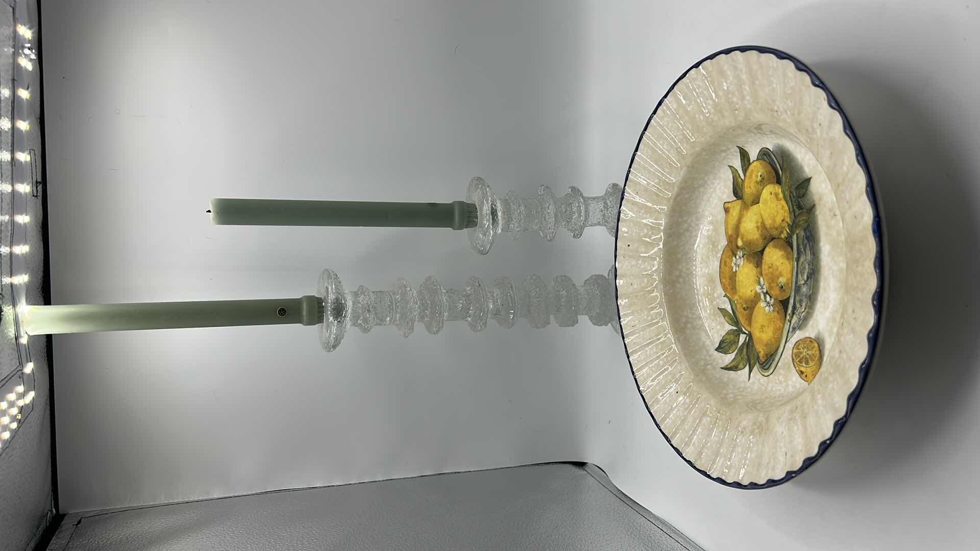 Photo 1 of GLAZED POTTERY BOWL W LEMONS AND TWO CRYSTAL CANDLE STICKS H13”