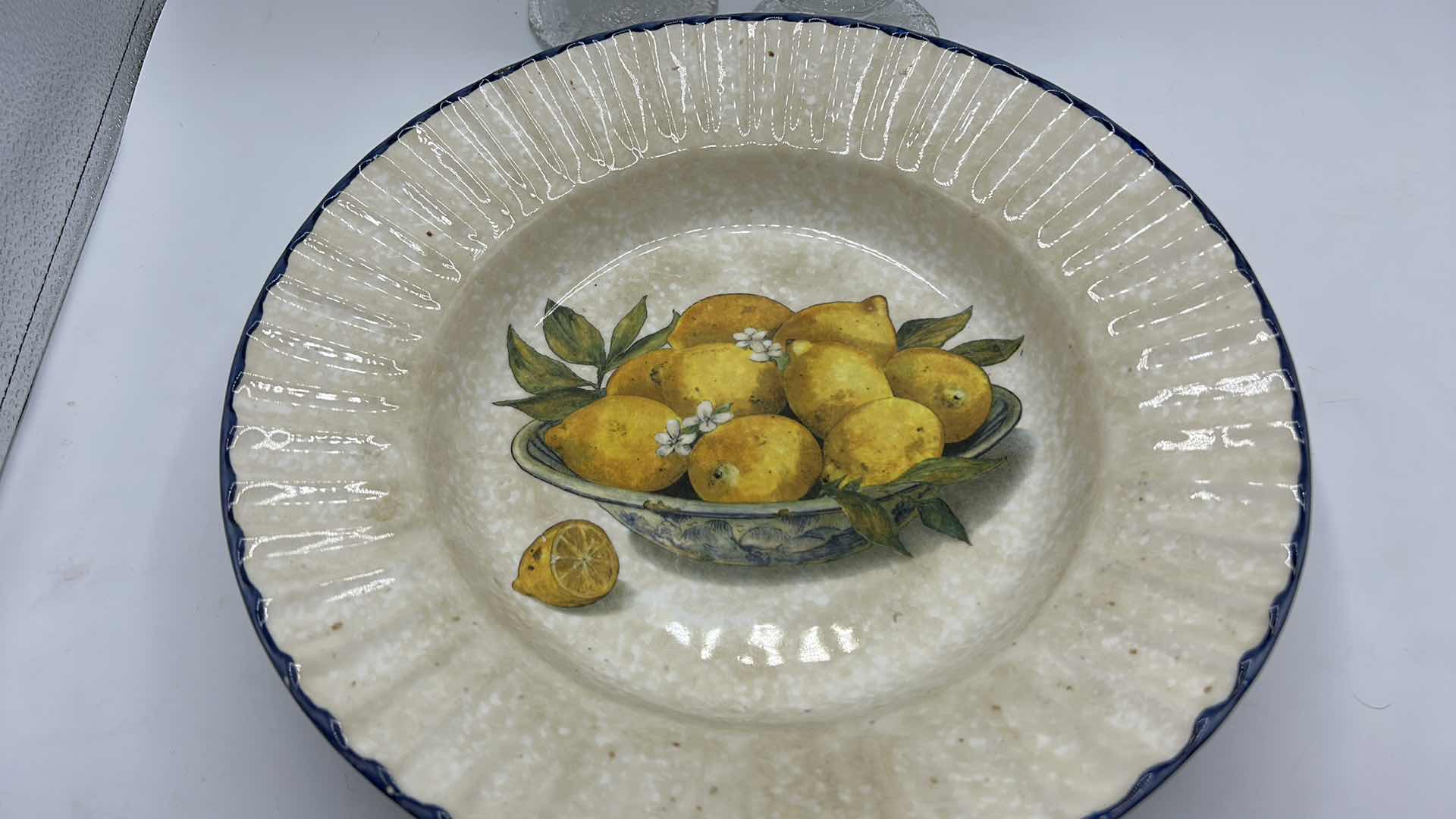 Photo 1 of GLAZED POTTERY BOWL W LEMONS AND TWO CRYSTAL CANDLE STICKS H13”