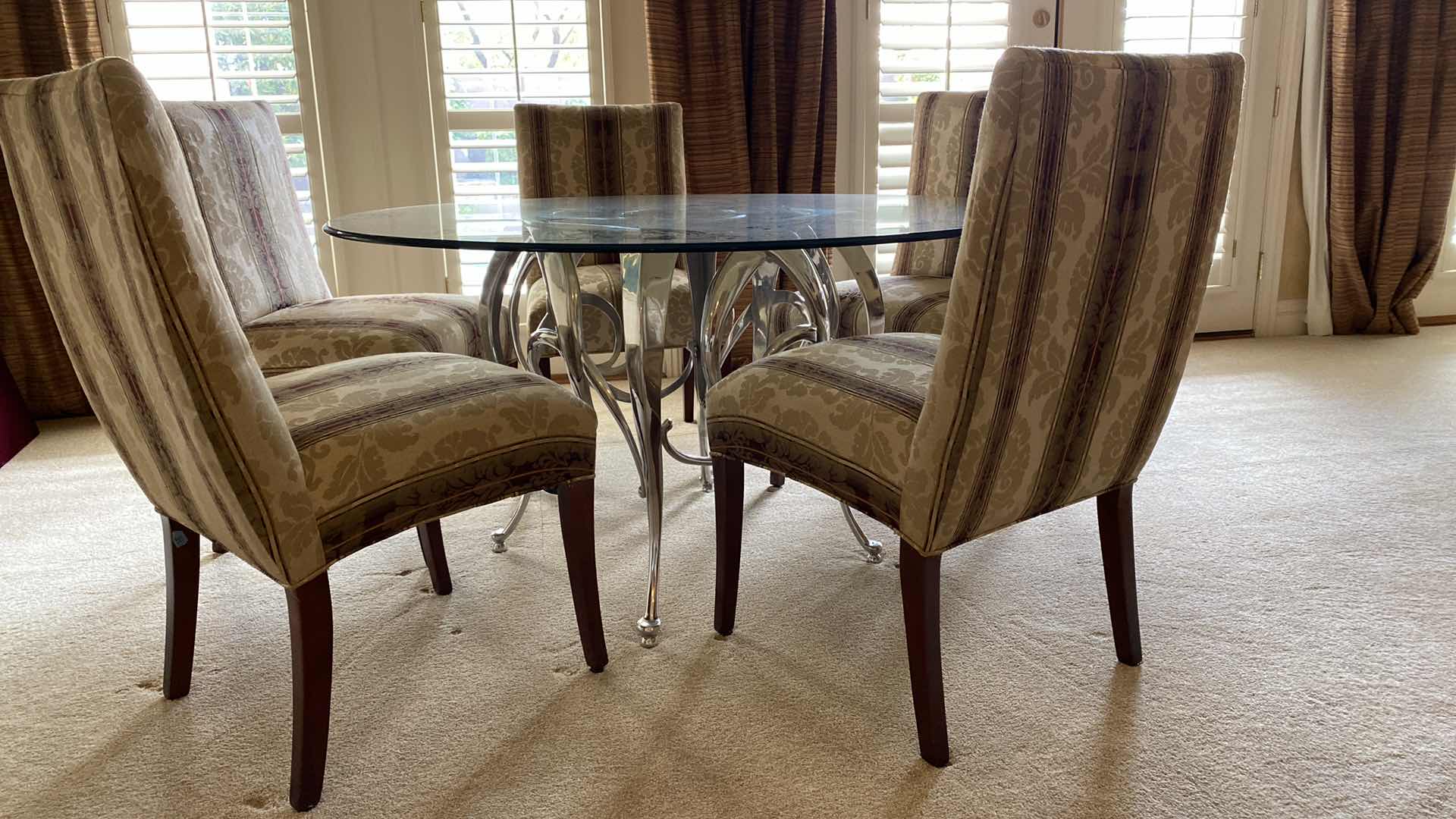 Photo 1 of ROUND BEVELED EDGE GLASS TABLE WITH SILVER METAL BASE AND 5 CHAIRS 54” H29” AND TABLE PROTECTOR