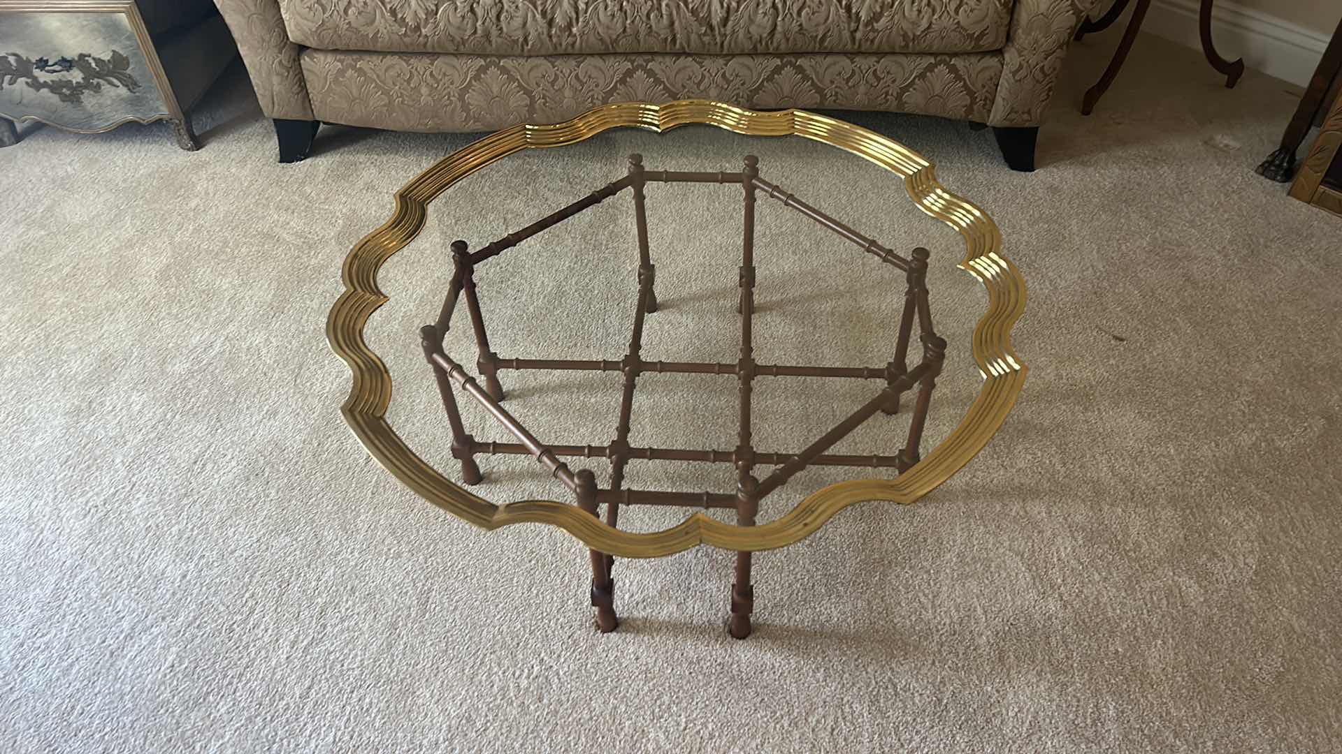 Photo 1 of UNIQUE SCALLOPED ROUND COFFEE TABLE WITH GOLD TRIM ON WOOD STAND 43” x 16”