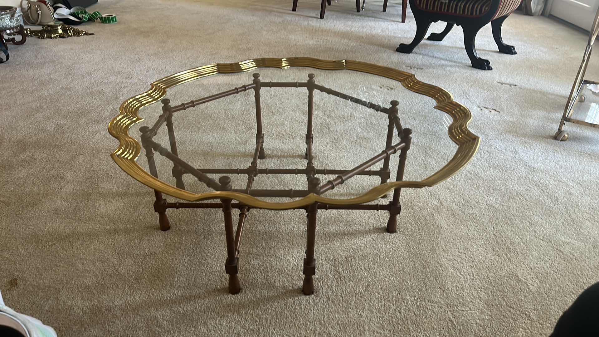 Photo 1 of UNIQUE SCALLOPED ROUND COFFEE TABLE WITH GOLD TRIM ON WOOD STAND 43” x 16”