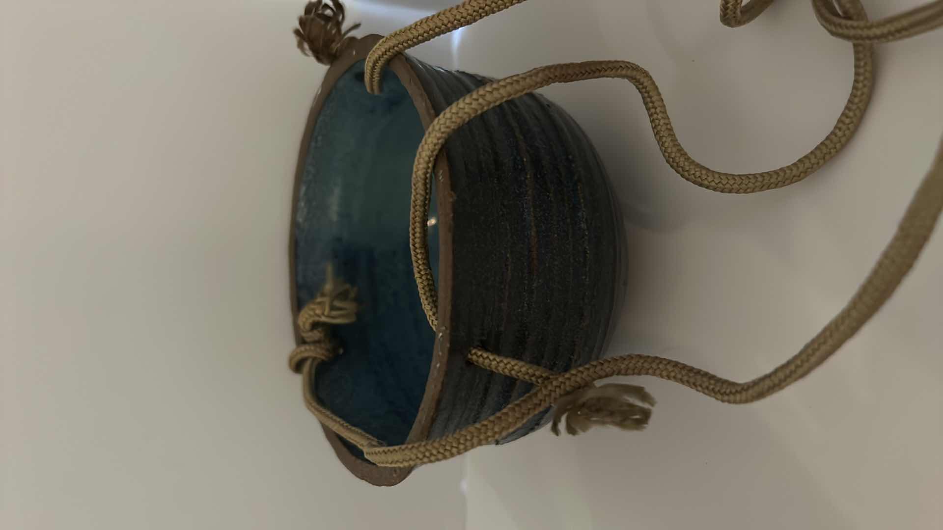 Photo 1 of POTTERY AND STONEWARE ASSORTMENT WITH TWO HANGING POTS 4” x 3”