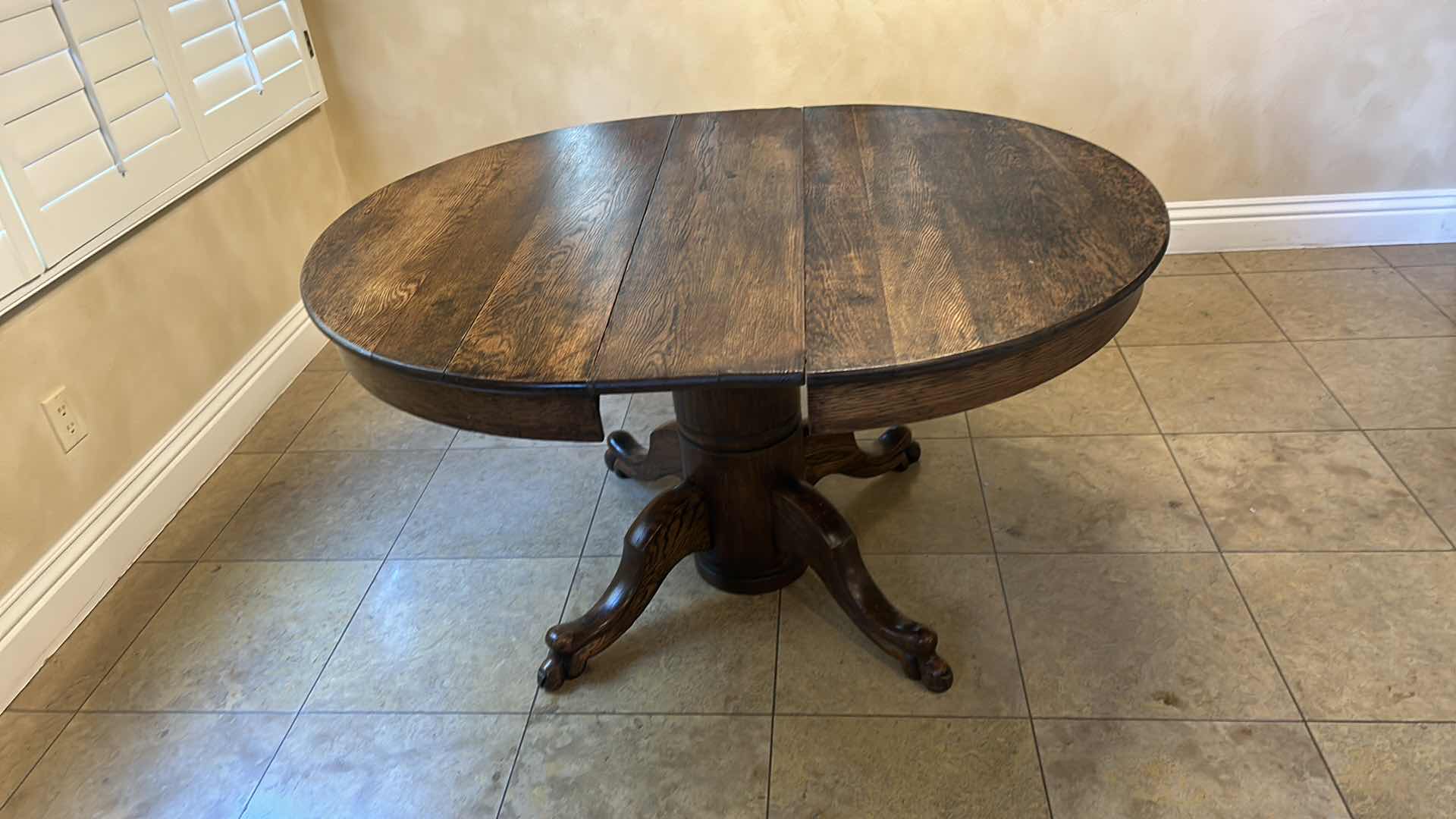 Photo 1 of ANTIQUE DOVE TAILED-WOOD PEDESTAL TABLE 42” x 51” x H 28.5”