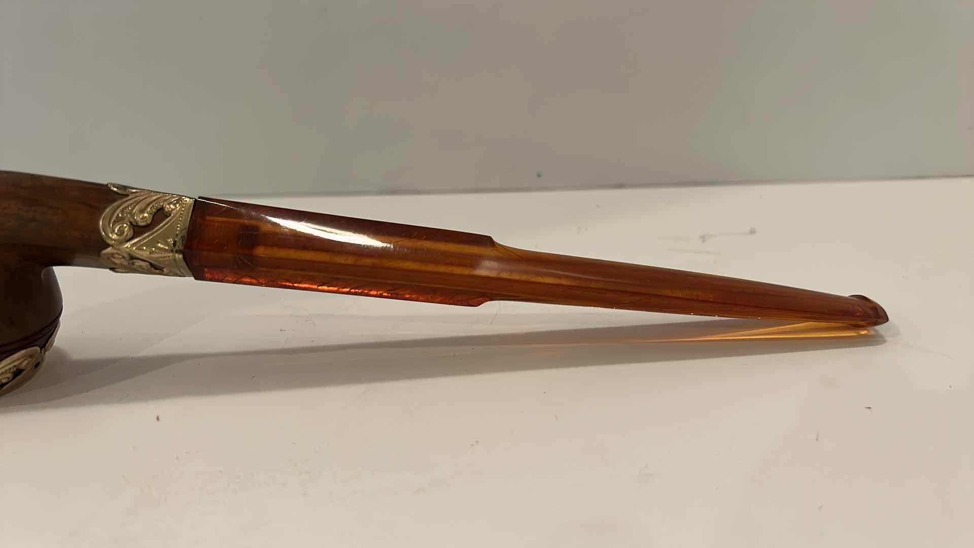 Photo 1 of VINTAGE FRENCH TOBACCO PIPE W/ CASE
(AMBER AND BURL PIPE WITH GOLD)