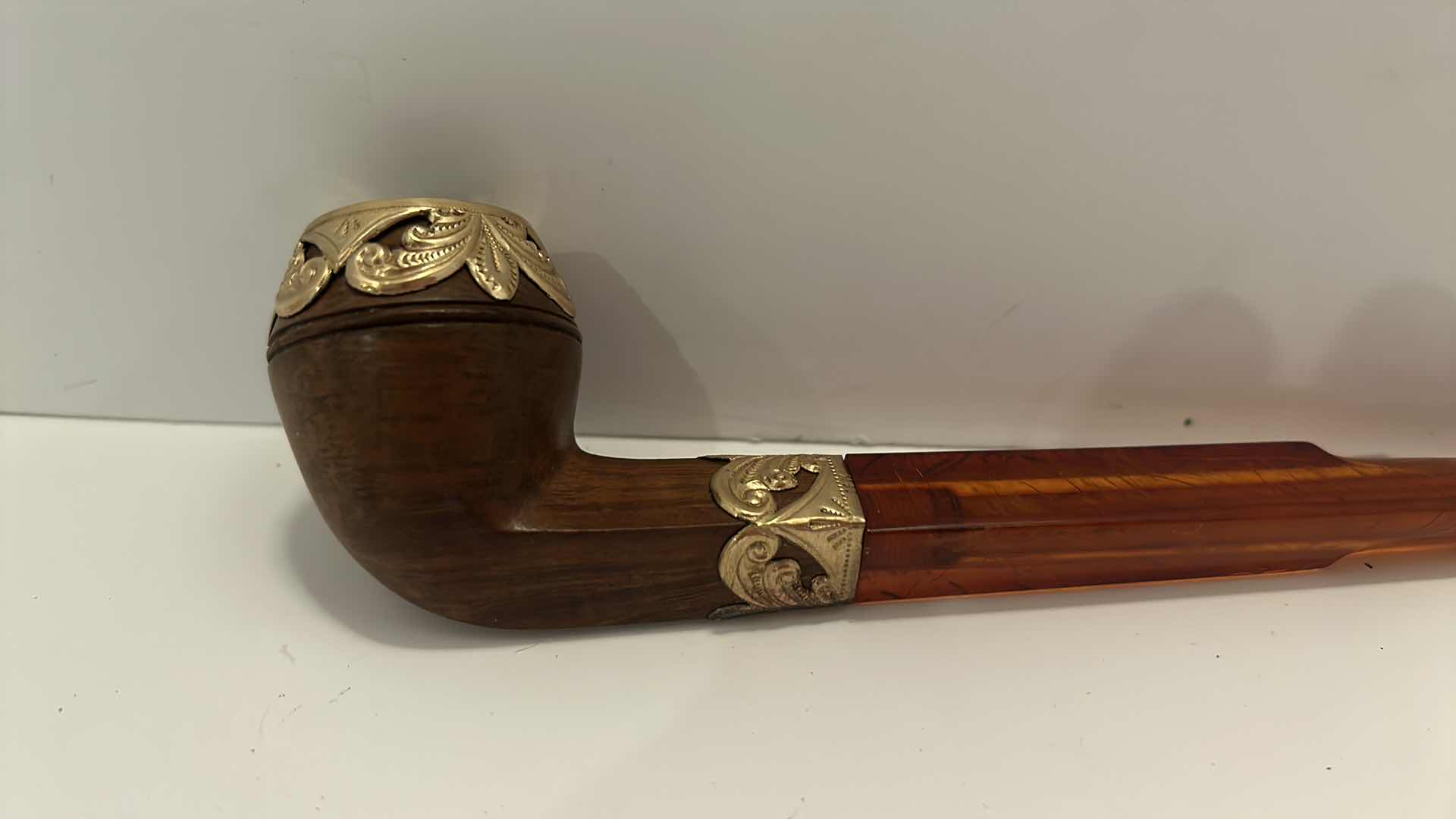 Photo 1 of VINTAGE FRENCH TOBACCO PIPE W/ CASE
(AMBER AND BURL PIPE WITH GOLD)