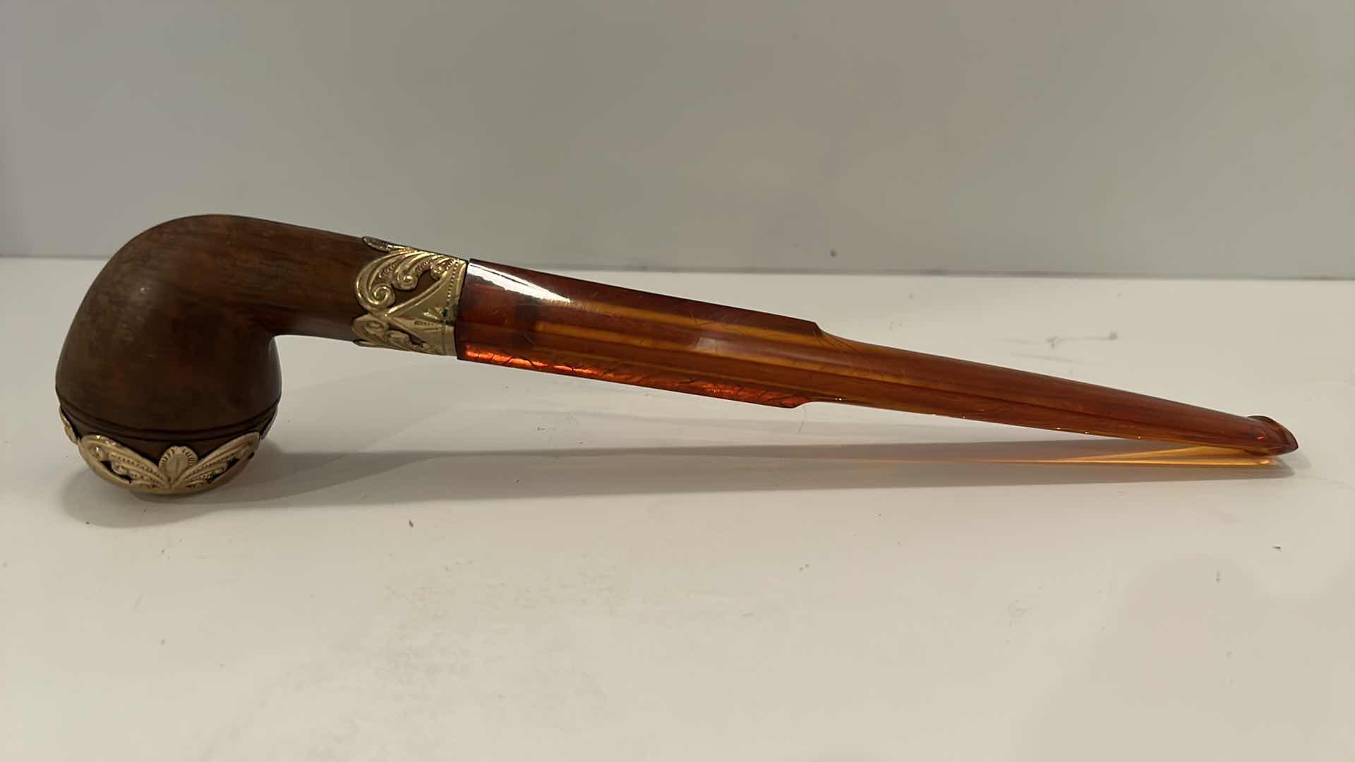 Photo 1 of VINTAGE FRENCH TOBACCO PIPE W/ CASE
(AMBER AND BURL PIPE WITH GOLD)