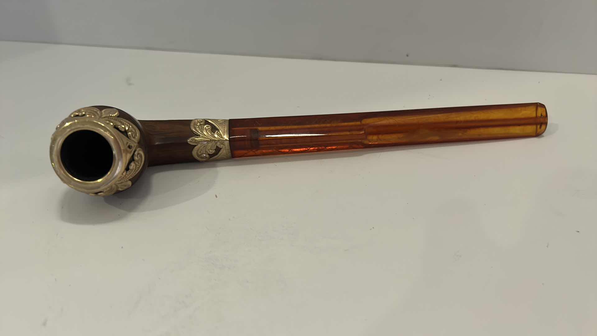 Photo 1 of VINTAGE FRENCH TOBACCO PIPE W/ CASE
(AMBER AND BURL PIPE WITH GOLD)