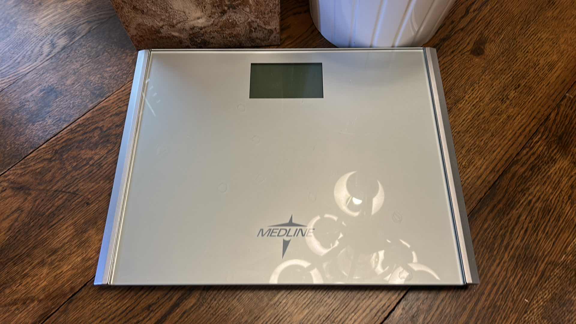 Photo 1 of TWO TRASH CANS AND BATHROOM SCALE