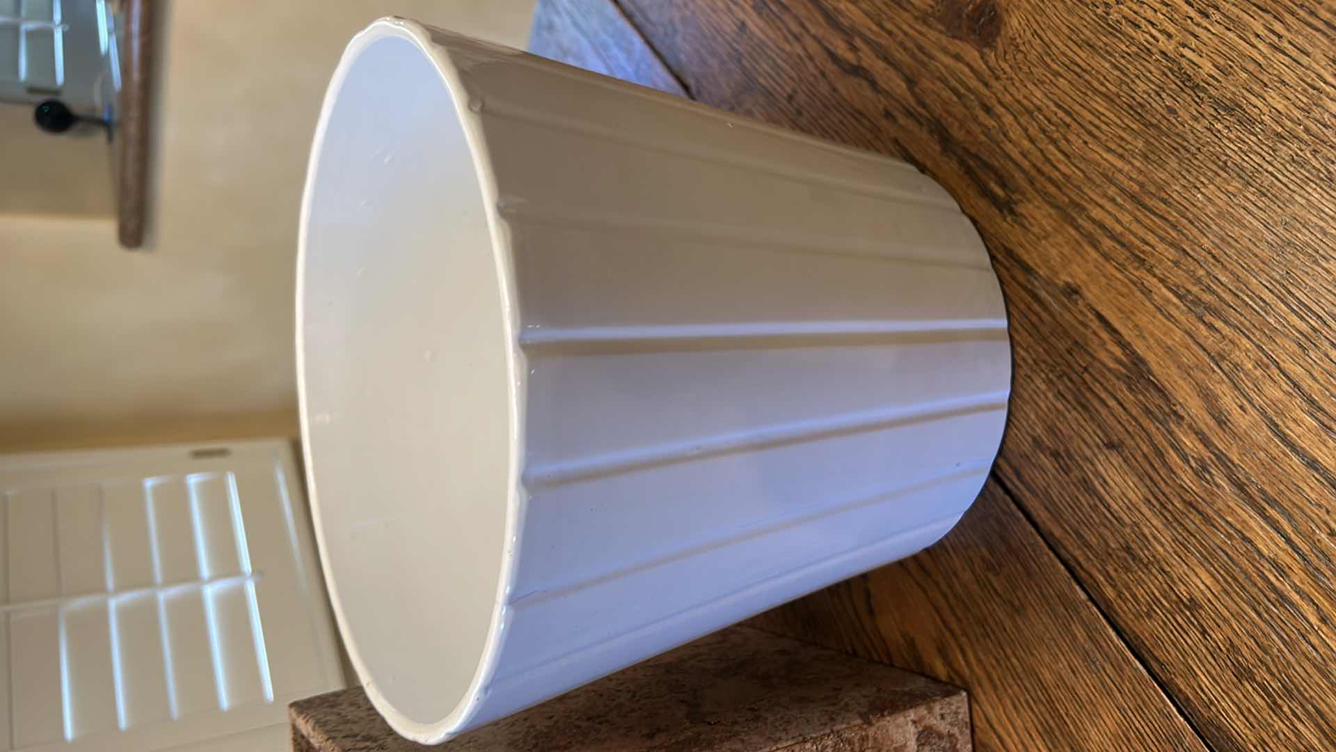 Photo 1 of TWO TRASH CANS AND BATHROOM SCALE