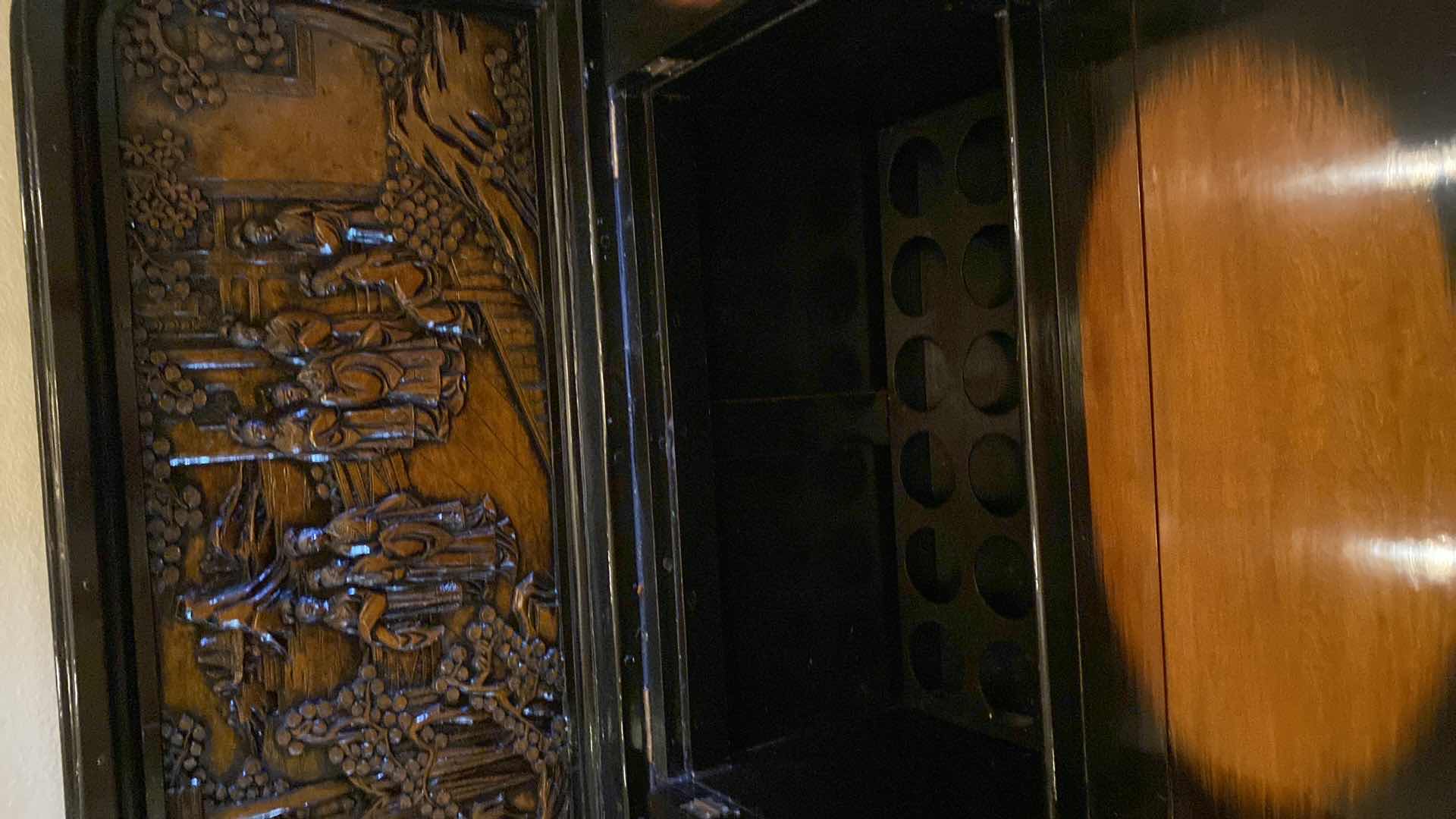 Photo 1 of ASIAN INSPIRED WOOD BAR CART WITH CARVINGS AND LACQUER FINISH OPEN MEASURES 47.5” X 26” H57”