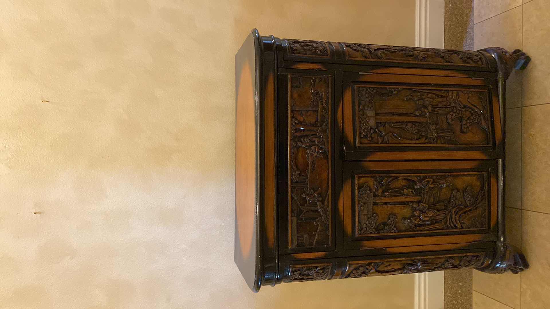 Photo 1 of ASIAN INSPIRED WOOD BAR CART WITH CARVINGS AND LACQUER FINISH OPEN MEASURES 47.5” X 26” H57”