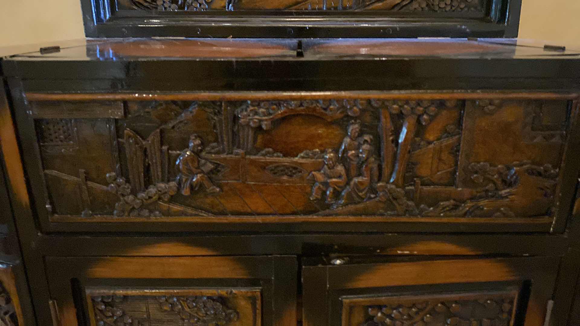 Photo 1 of ASIAN INSPIRED WOOD BAR CART WITH CARVINGS AND LACQUER FINISH OPEN MEASURES 47.5” X 26” H57”