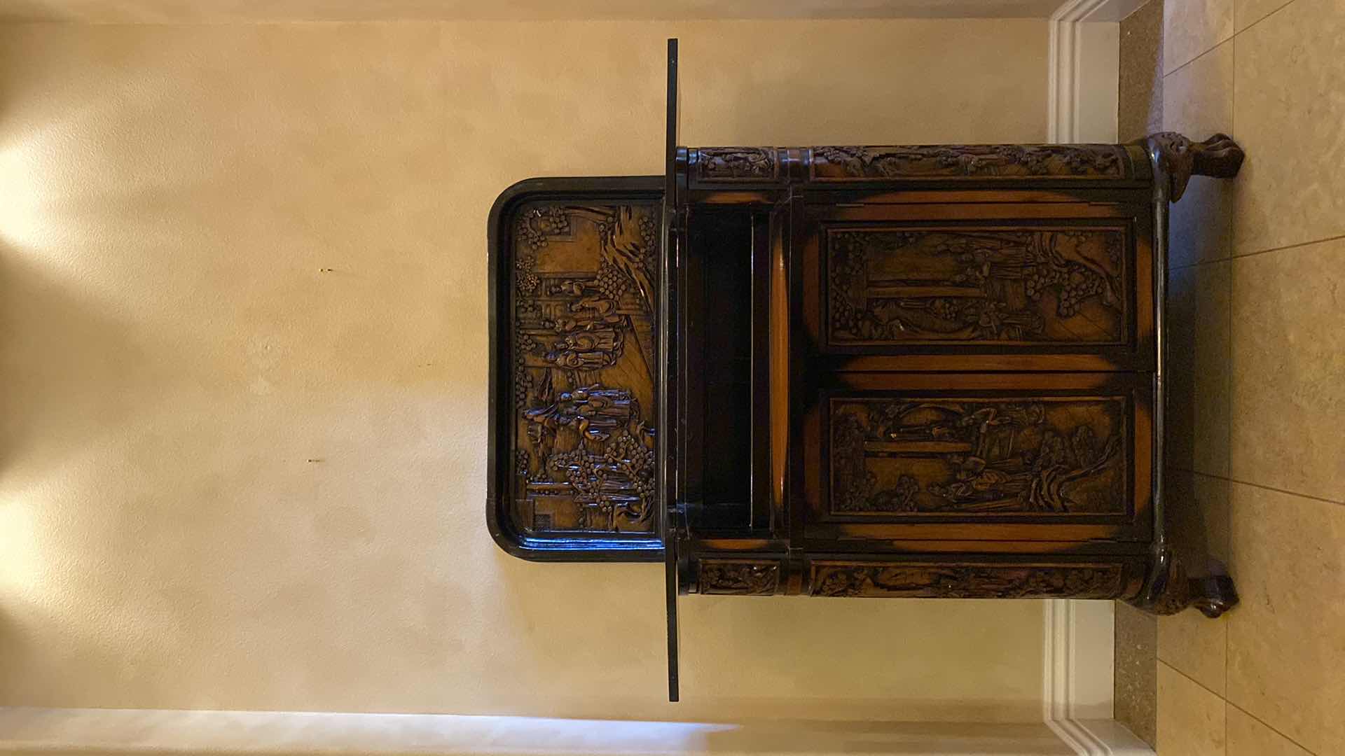 Photo 1 of ASIAN INSPIRED WOOD BAR CART WITH CARVINGS AND LACQUER FINISH OPEN MEASURES 47.5” X 26” H57”