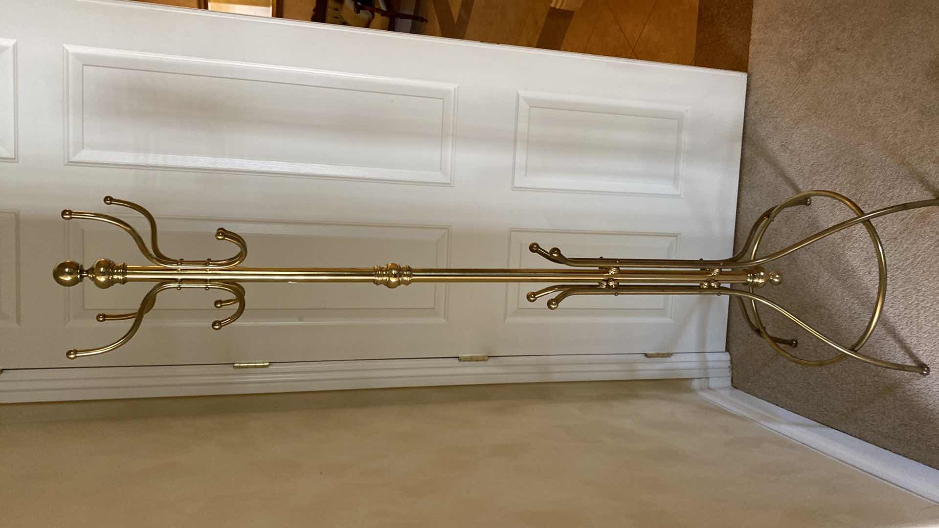 Photo 1 of BRASS COAT RACK H75”