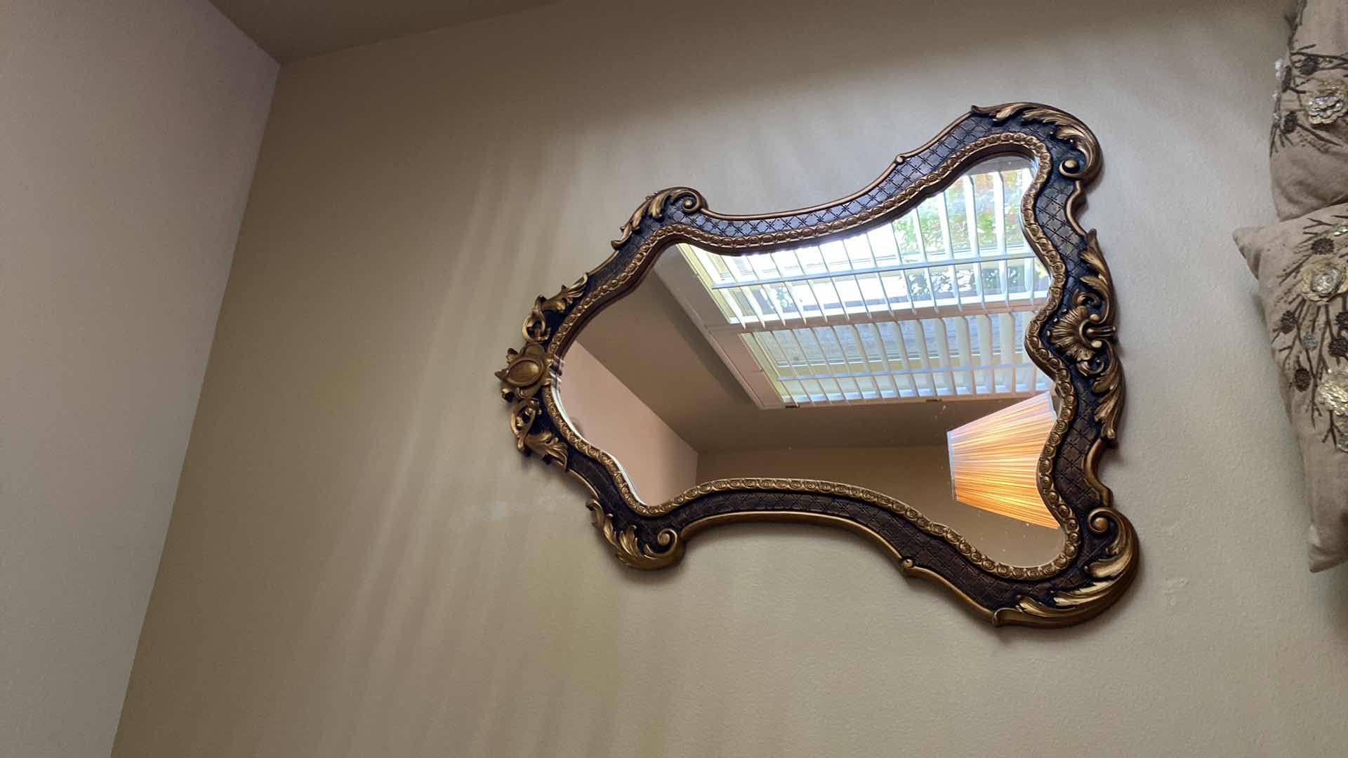 Photo 1 of ORNATE GOLD AND BRONZE WALL MIRROR 35” X 42”