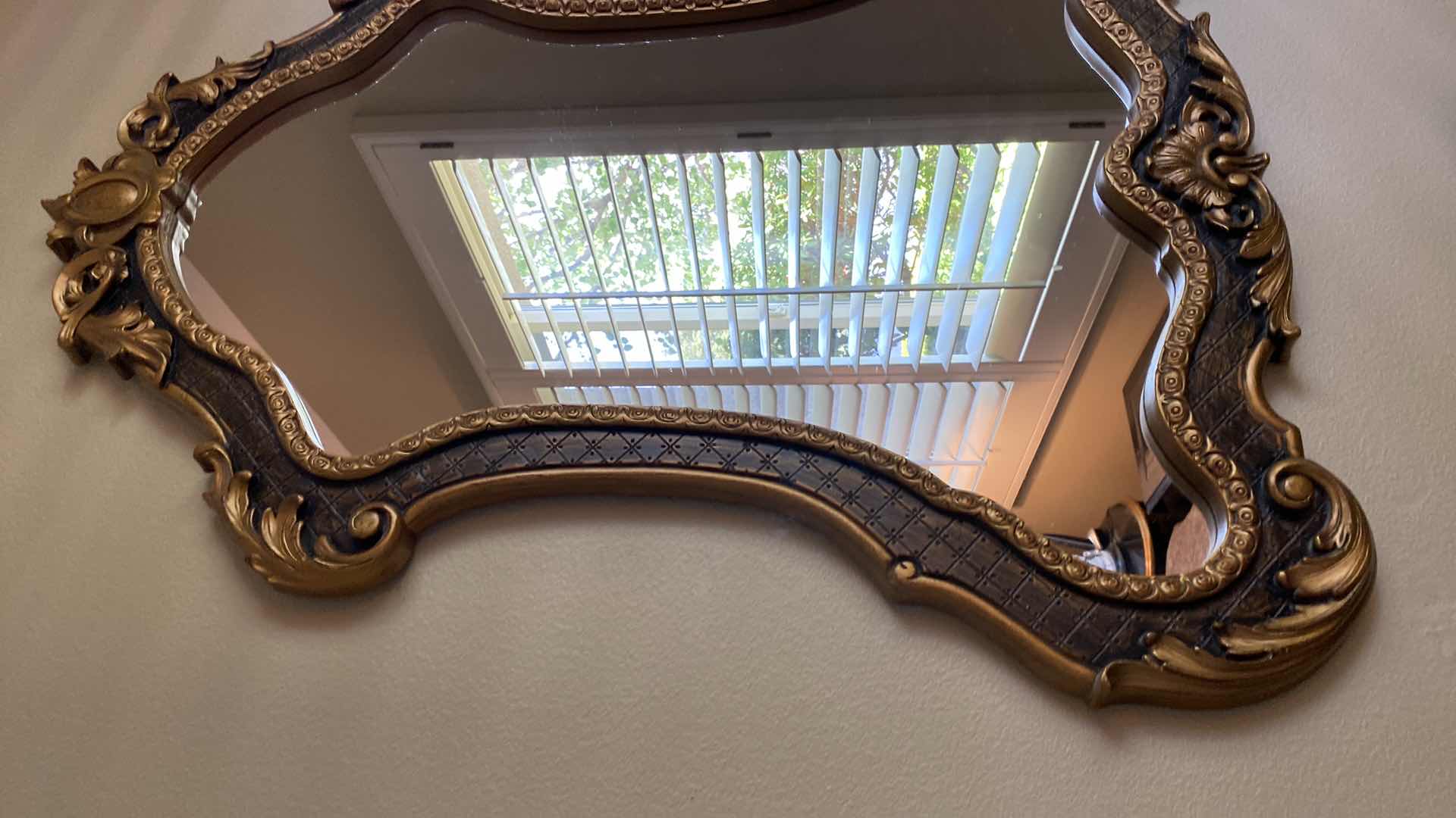 Photo 1 of ORNATE GOLD AND BRONZE WALL MIRROR 35” X 42”