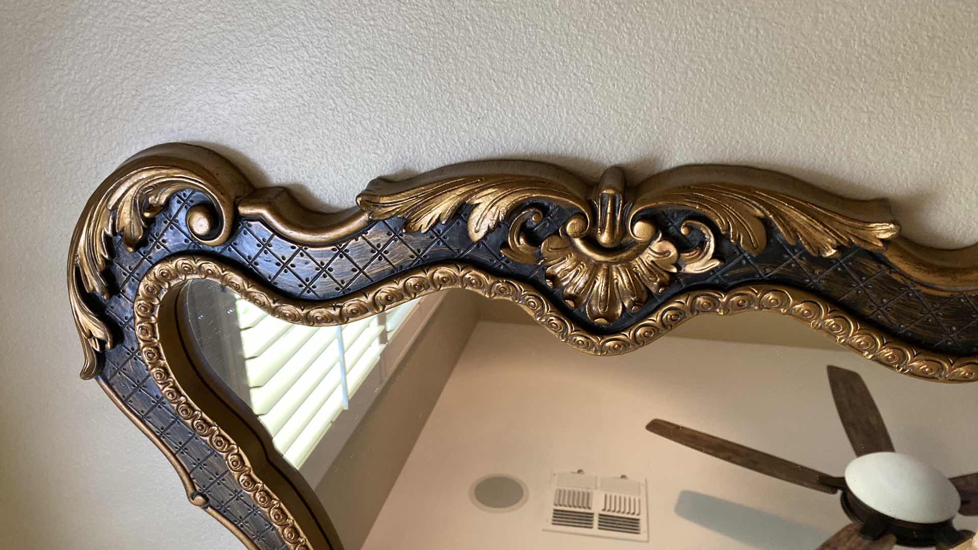 Photo 1 of ORNATE GOLD AND BRONZE WALL MIRROR 35” X 42”