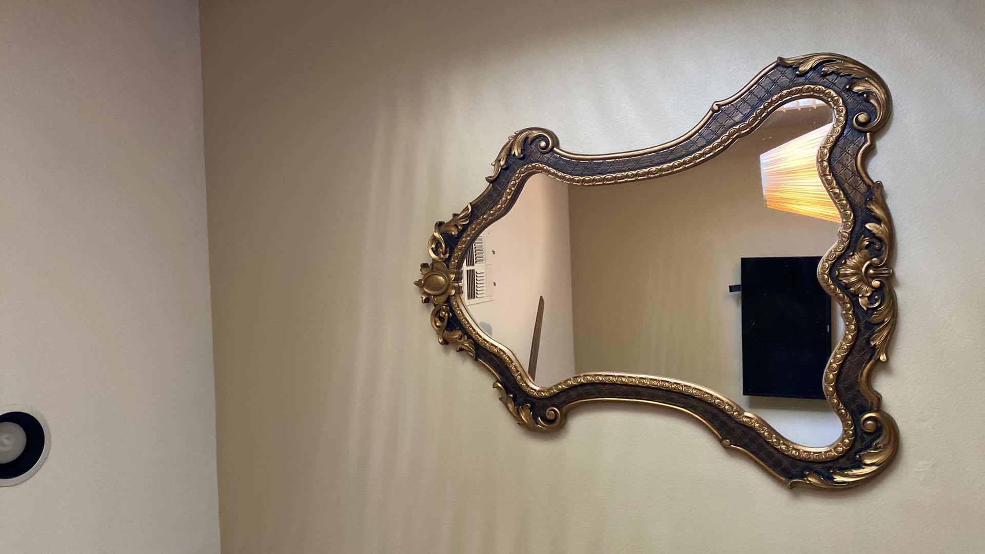 Photo 1 of ORNATE GOLD AND BRONZE WALL MIRROR 35” X 42”