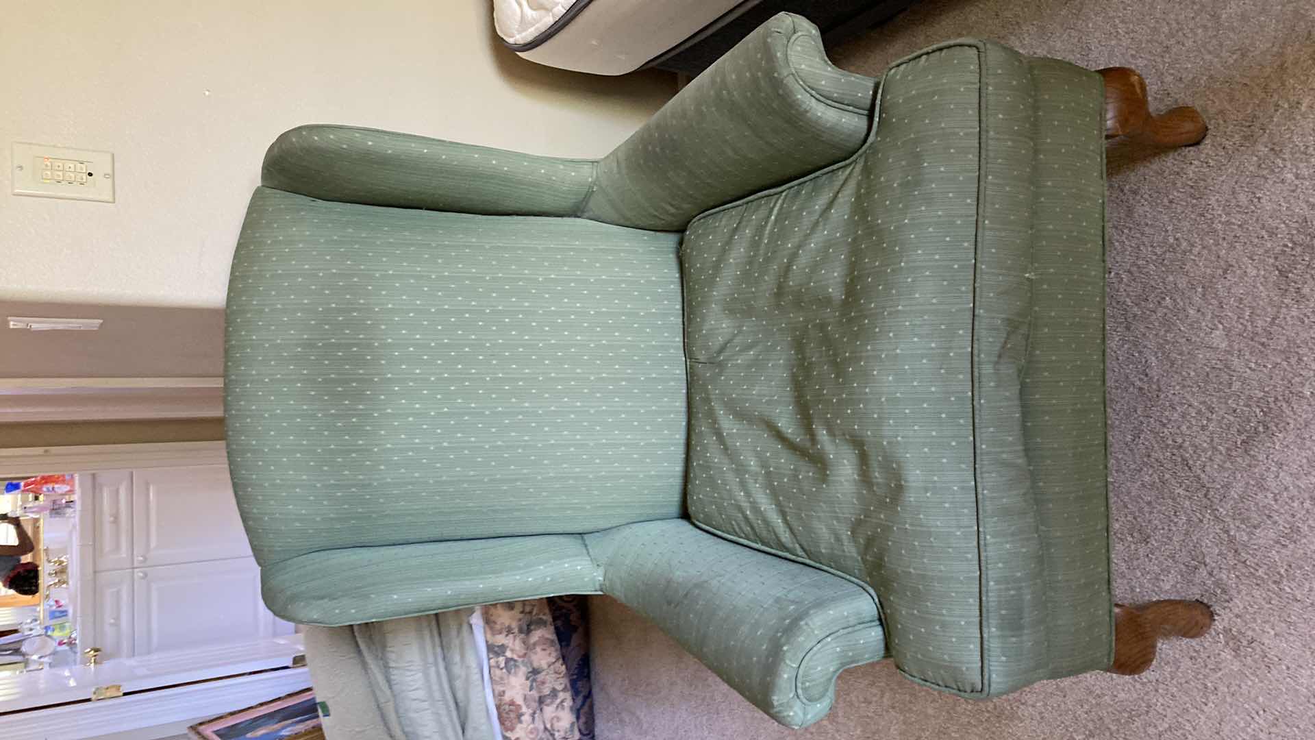 Photo 1 of GREEN UPHOLSTERED WING BACK CHAIR