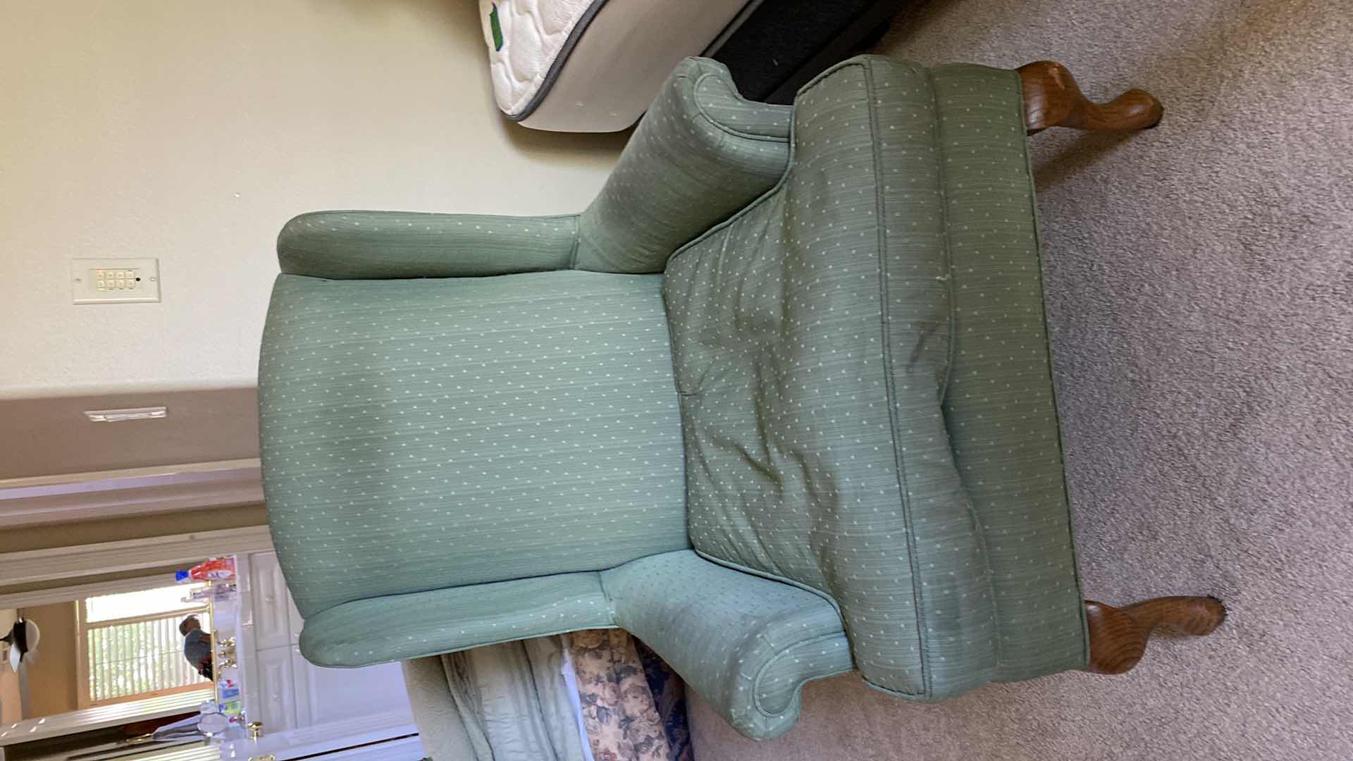 Photo 1 of GREEN UPHOLSTERED WING BACK CHAIR