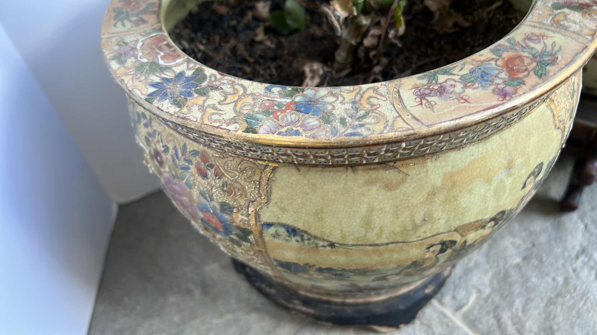 Photo 1 of TWO LIVE PLANTS IN PORCELAIN POTTERY W STANDS TALLEST H8”