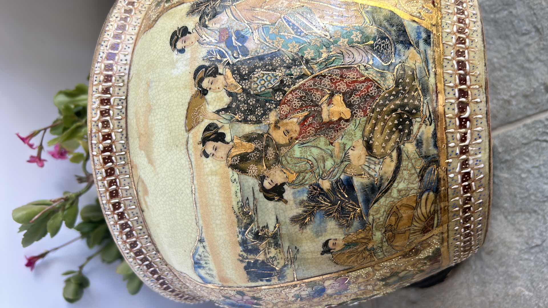 Photo 1 of TWO LIVE PLANTS IN PORCELAIN POTTERY W STANDS TALLEST H8”