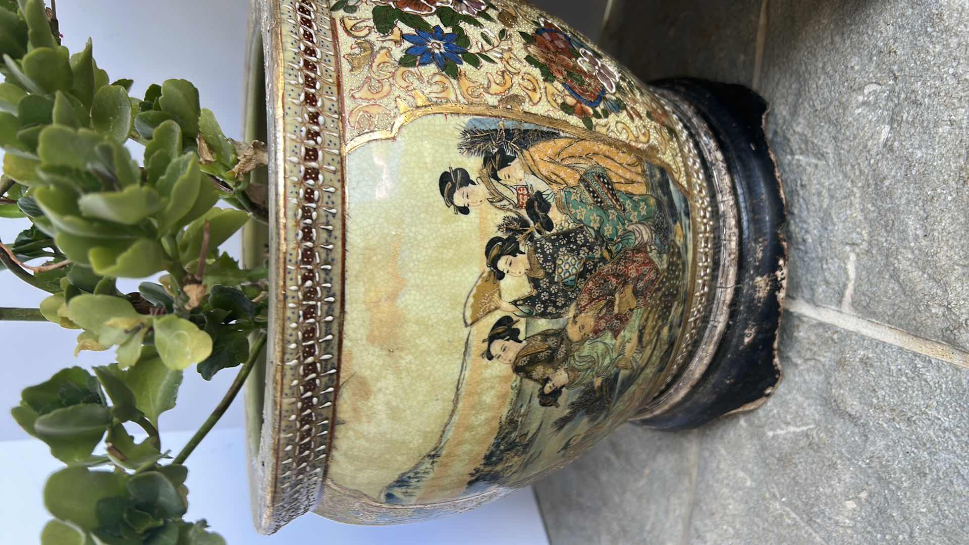 Photo 1 of TWO LIVE PLANTS IN PORCELAIN POTTERY W STANDS TALLEST H8”