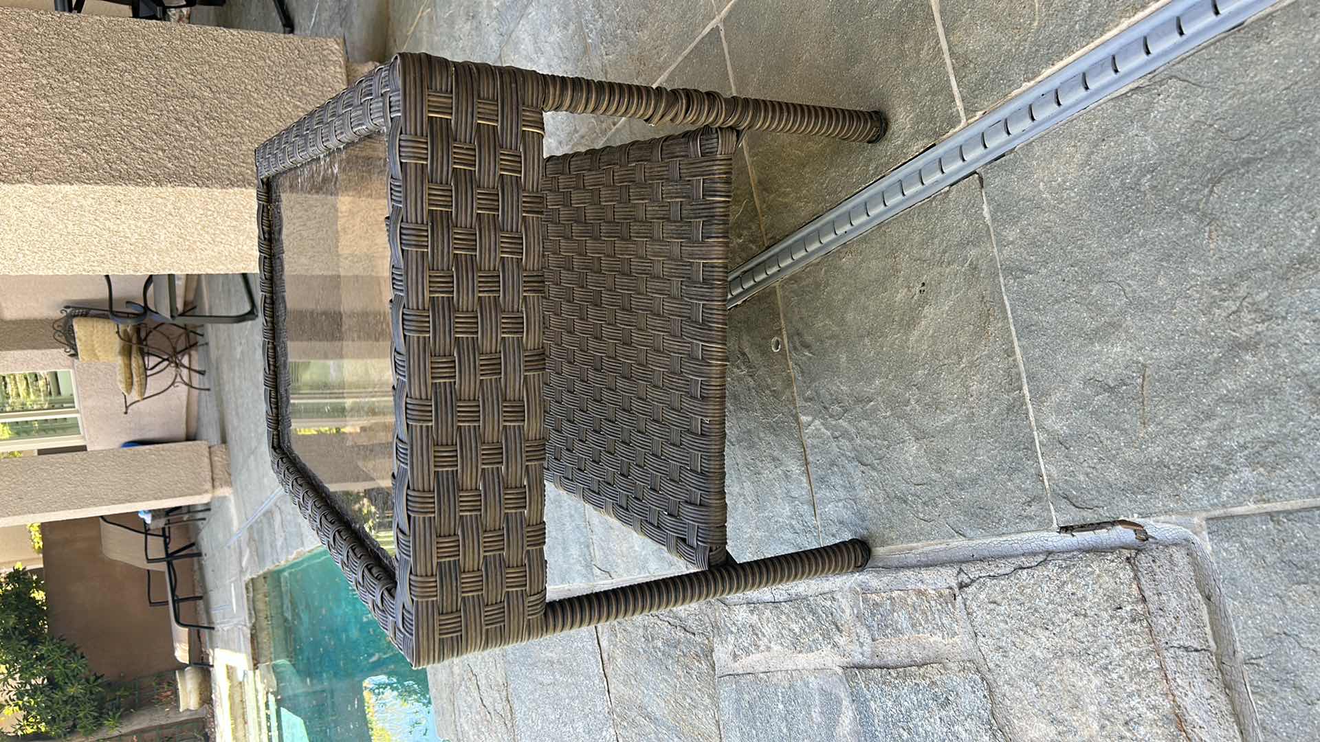 Photo 1 of STYLEWELL FAUX WICKER AND GLASS OUTDOOR COFFEE TABLE 30” x 18”