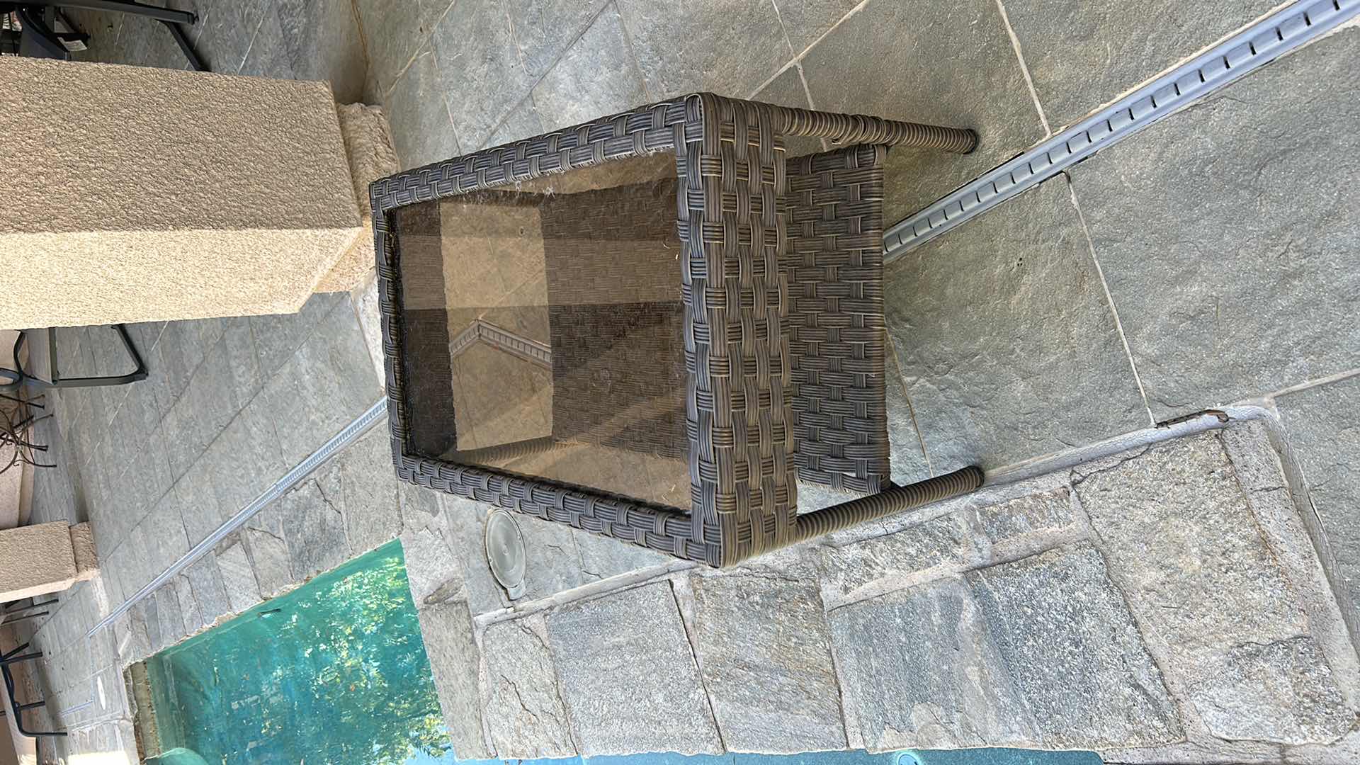 Photo 1 of STYLEWELL FAUX WICKER AND GLASS OUTDOOR COFFEE TABLE 30” x 18”