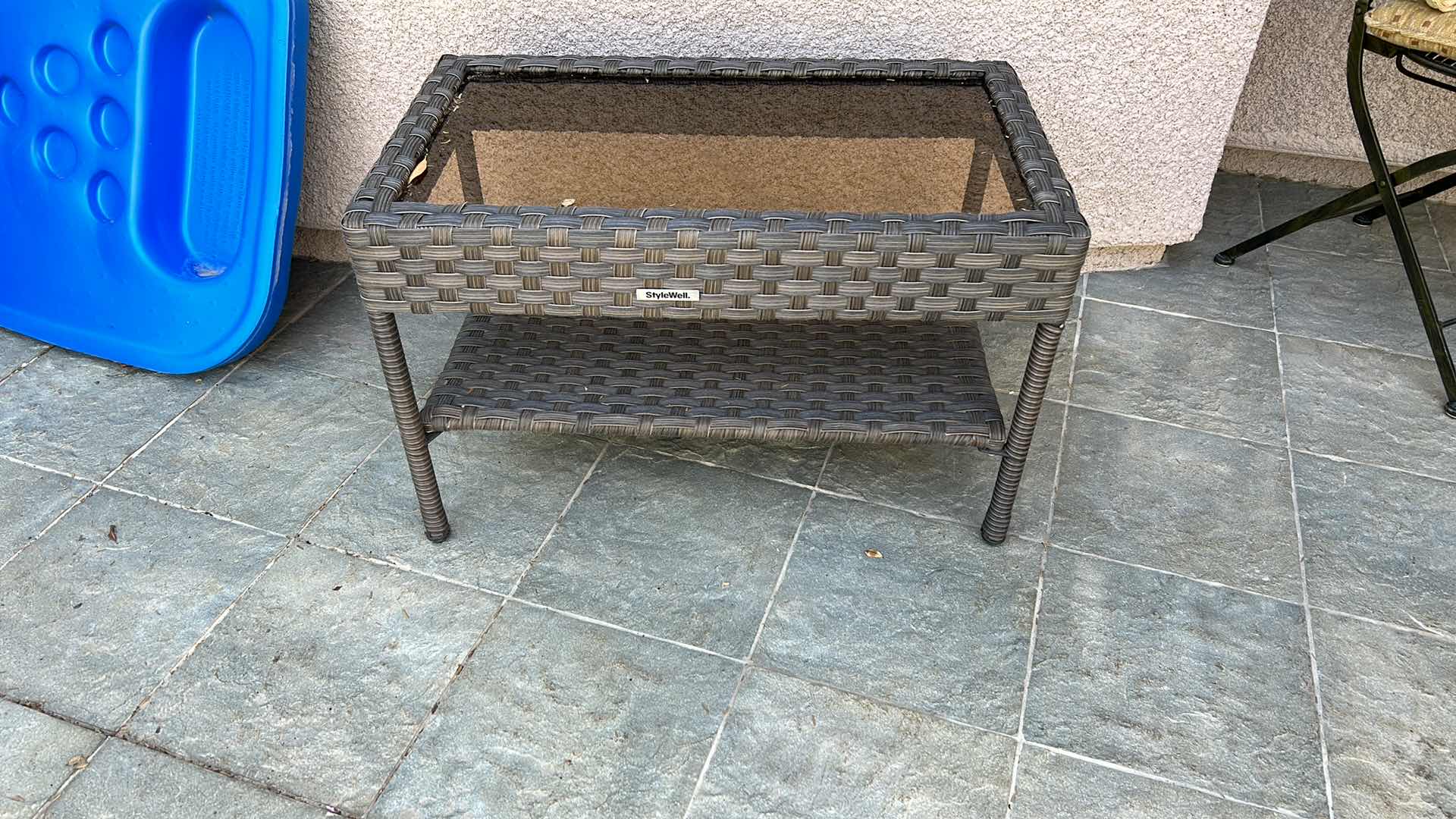 Photo 1 of STYLE WELL FAUX WICKER AND GLASS OUTDOOR COFFEE TABLE 30” x 18”