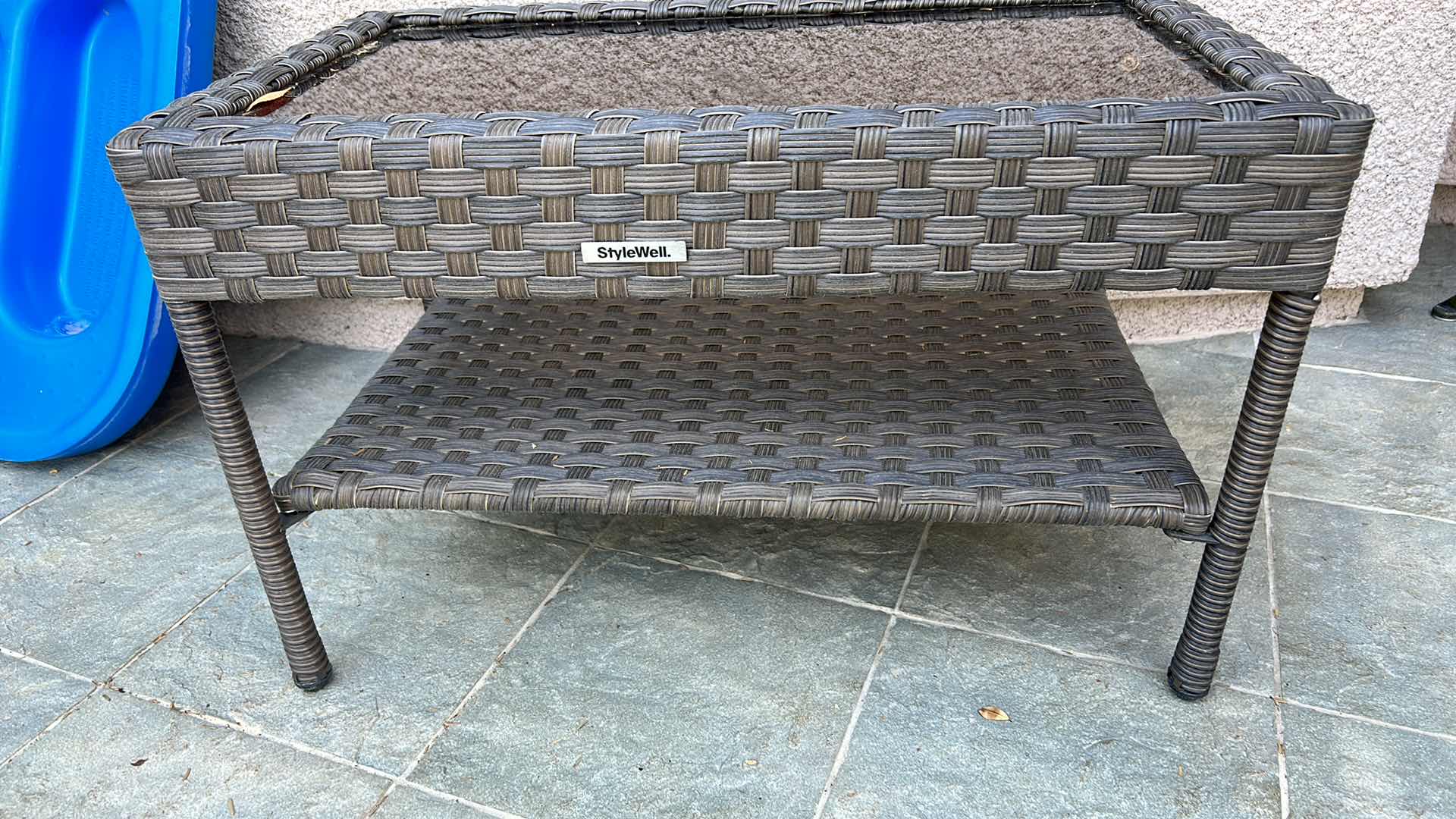 Photo 1 of STYLE WELL FAUX WICKER AND GLASS OUTDOOR COFFEE TABLE 30” x 18”