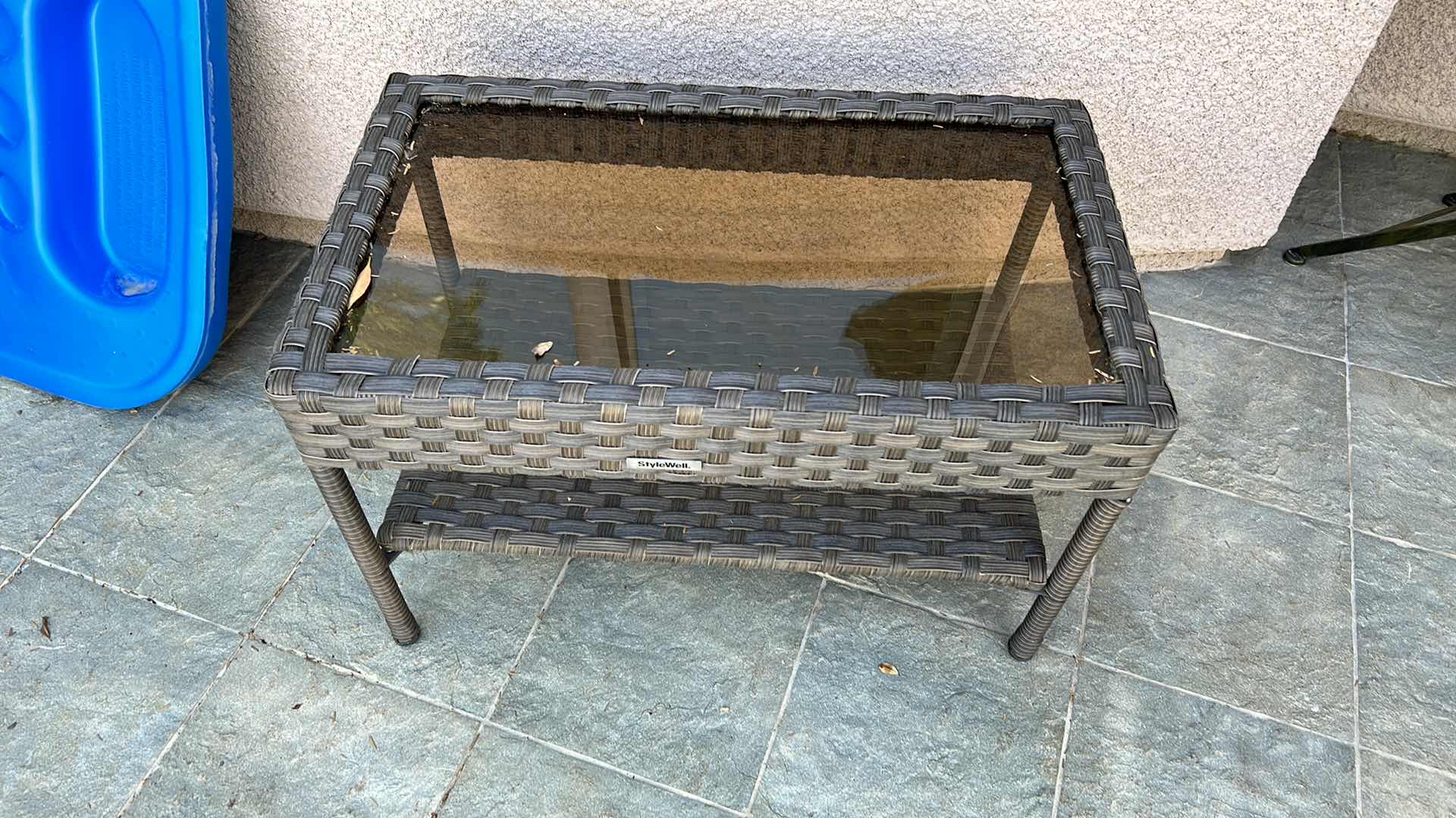 Photo 1 of STYLE WELL FAUX WICKER AND GLASS OUTDOOR COFFEE TABLE 30” x 18”