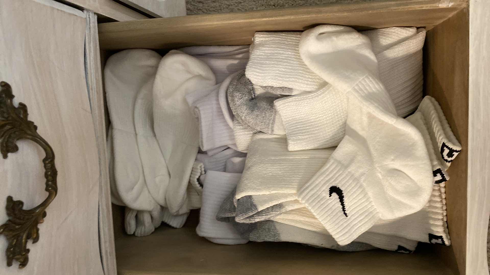 Photo 1 of CONTENTS OF 4 DRAWERS OF MENS SOCKS