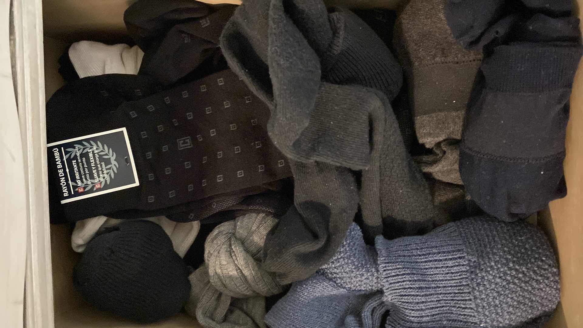 Photo 1 of CONTENTS OF 4 DRAWERS OF MENS SOCKS