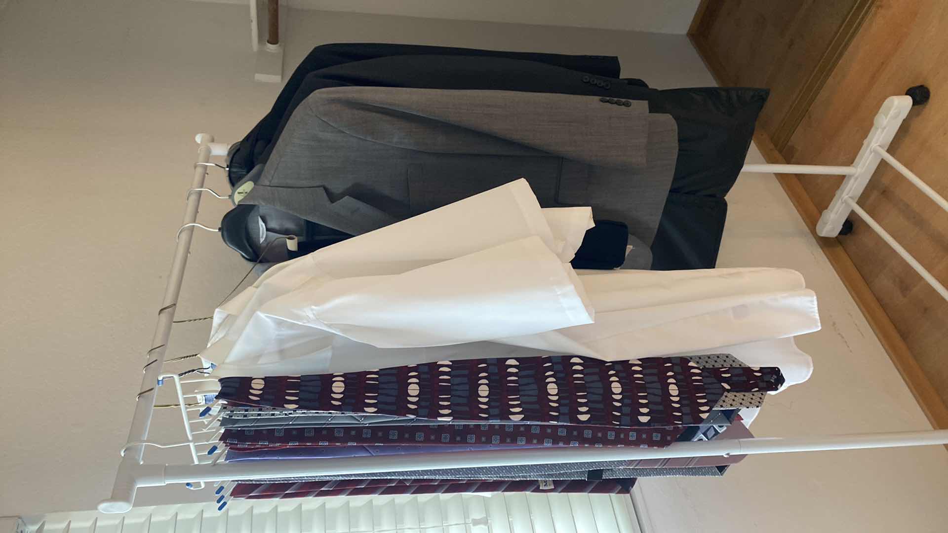 Photo 1 of MENS JACKETS SHIRTS  SLACKS AND TIES, SHIRTS SIZE 18 SLACKS 42 JACKETS EST XL OR 2XL