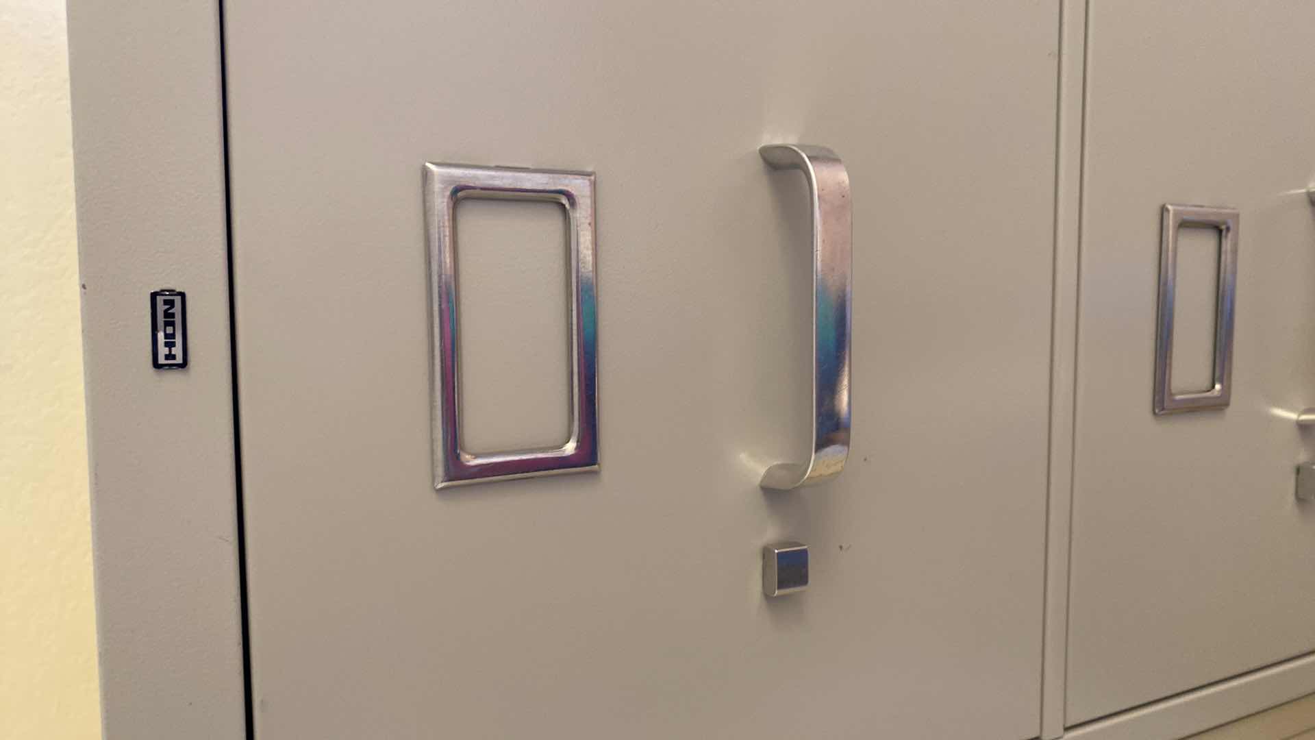 Photo 1 of HON ALMOND 4 DRAWER FILE CABINET