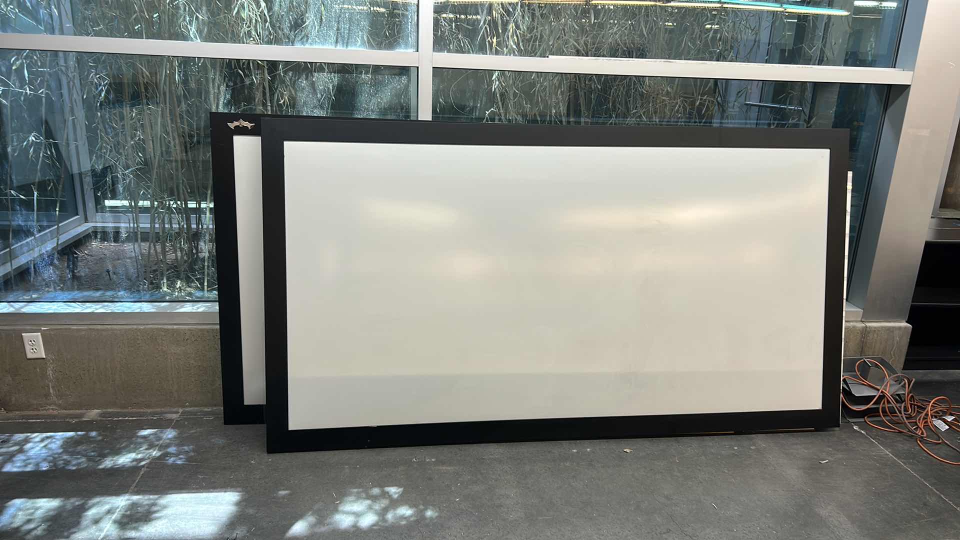 Photo 1 of LARGE BLACK FRAMED WHITE BOARD 8’ 5” x 4’7”