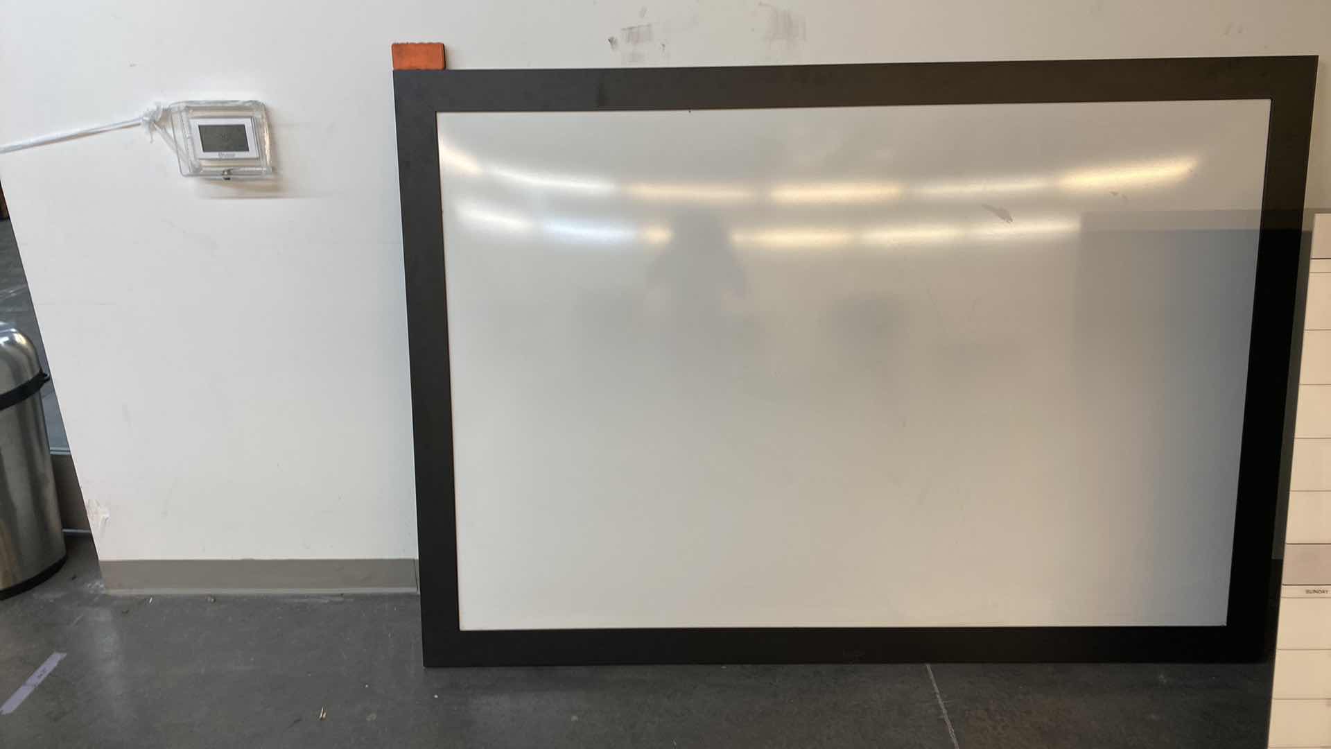 Photo 1 of FRAMED DRY ERASE BOARD 78” X 55”