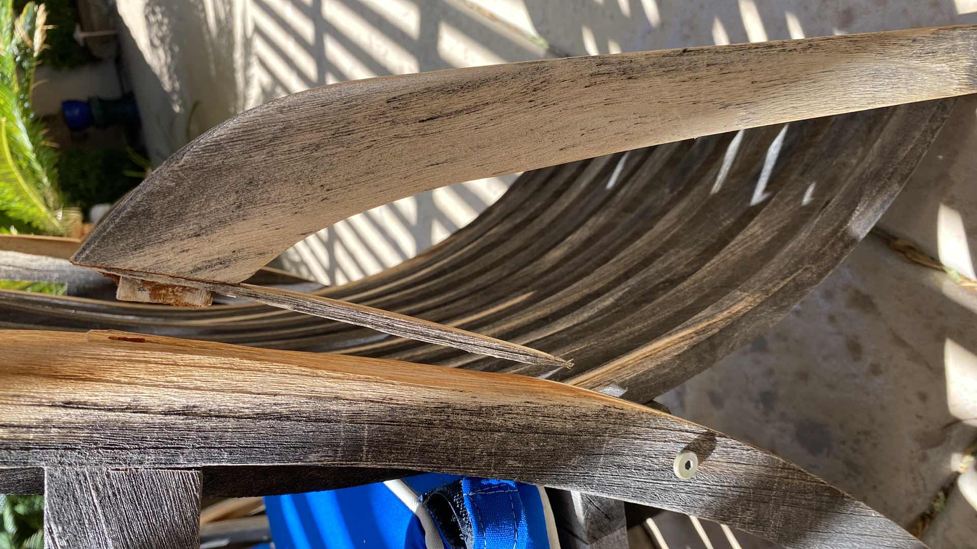 Photo 1 of TEAK WAREHOUSE DINING SET WITH 4 CHAIRS MARINE BLUE WATER REPELLANT AND SUN PROTECTION FABRIC AND POTTED PLANT - TABLE 43” H29” 