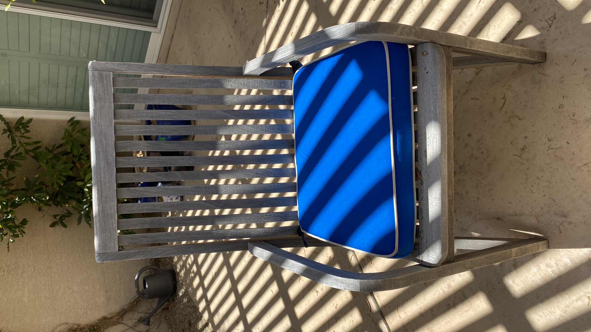 Photo 1 of TEAK WAREHOUSE DINING SET WITH 4 CHAIRS MARINE BLUE WATER REPELLANT AND SUN PROTECTION FABRIC AND POTTED PLANT - TABLE 43” H29” 